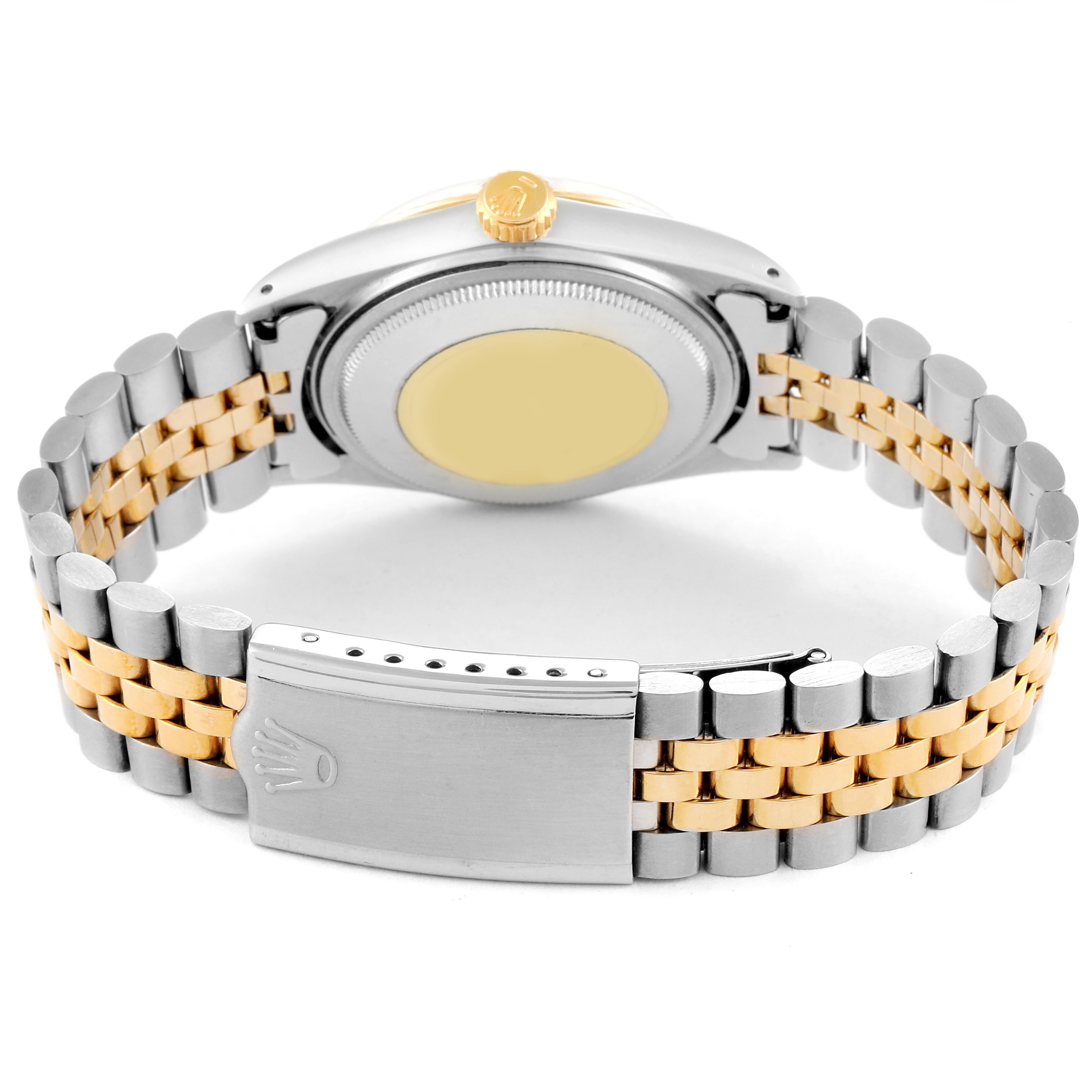 The image shows the backside of the Rolex Vintage Collection 16013 Men's Steel and Gold (two tone) White Dial 16013 Men's Steel and Gold (two tone) White Dial watch, highlighting the bracelet and clasp.