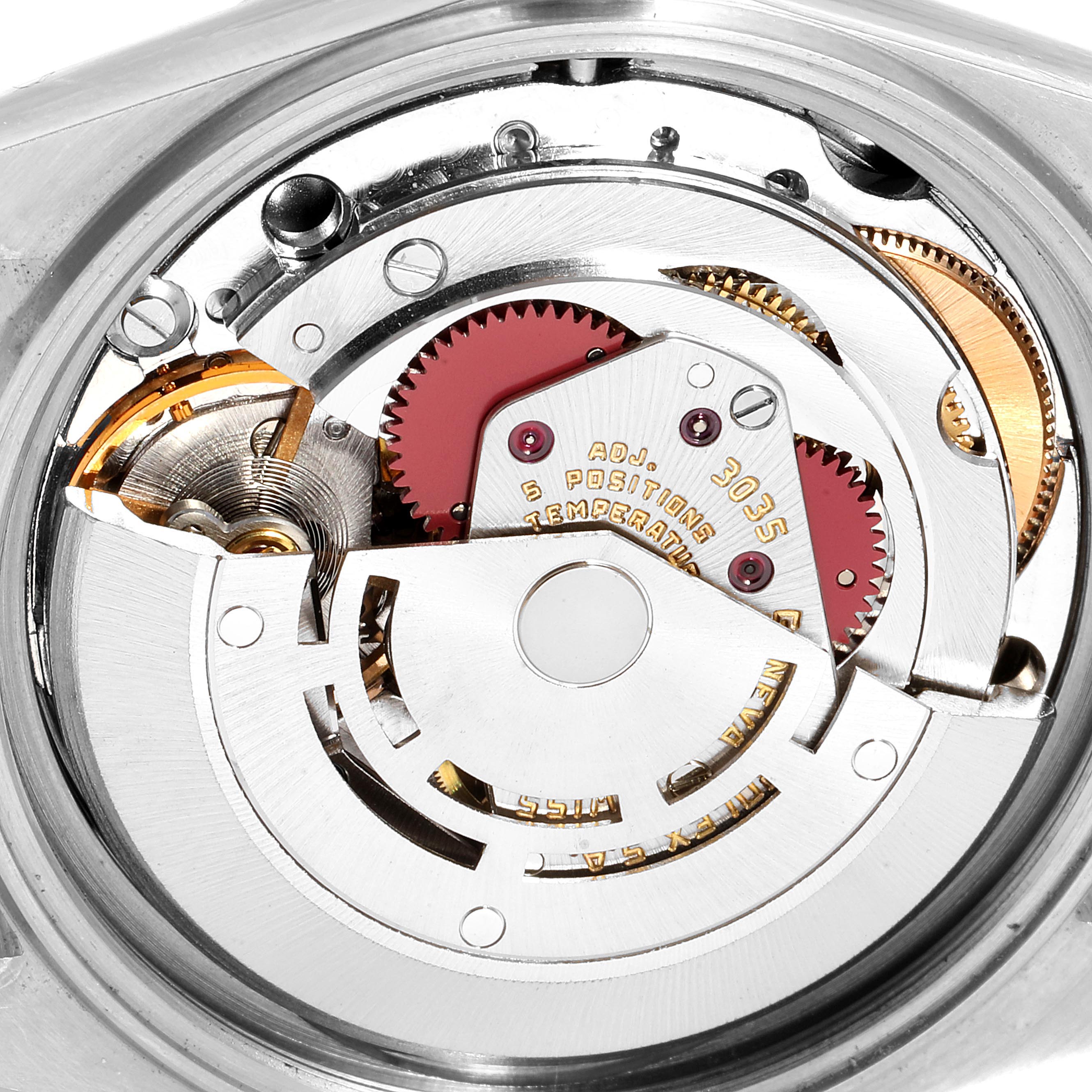 This image shows the intricate internal mechanics of a Rolex Vintage Collection 16013 Men's Steel and Gold (two tone) White Dial 16013 Men's Steel and Gold (two tone) White Dial watch, focusing on the movement components from a top-down angle.