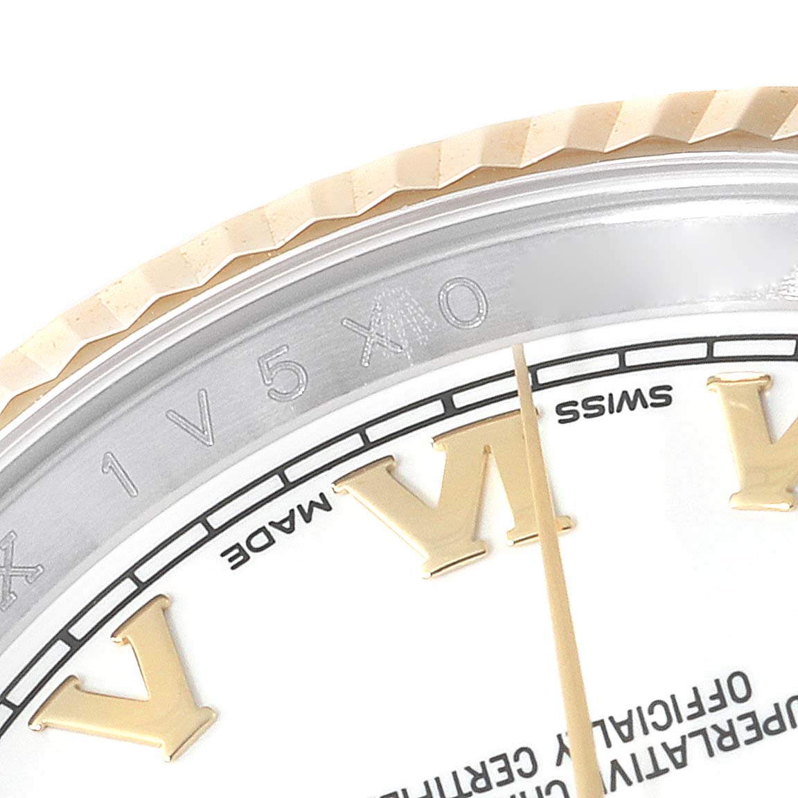 The image shows a close-up of the dial and fluted bezel of a Rolex Datejust 116233 Men's Steel and Gold (two tone) White Dial 116233 Men's Steel and Gold (two tone) White Dial watch, highlighting the Roman numeral markers and 'Swiss Made' text.