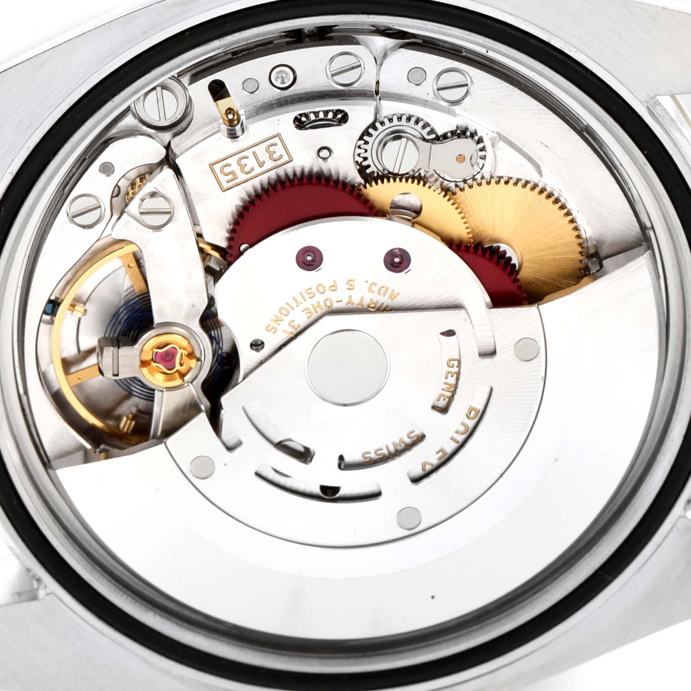 The image shows the movement parts of a Rolex Datejust 116233 Men's Steel and Gold (two tone) White Dial 116233 Men's Steel and Gold (two tone) White Dial watch from a rear angle view, revealing gears and internal mechanisms.
