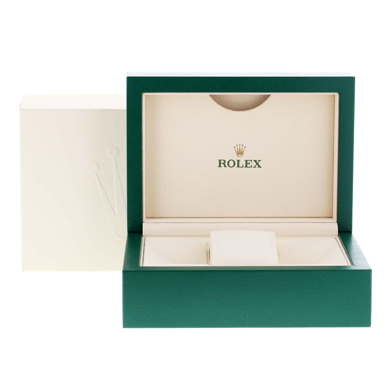 This image shows an open Rolex watch box and outer case for the Explorer model.