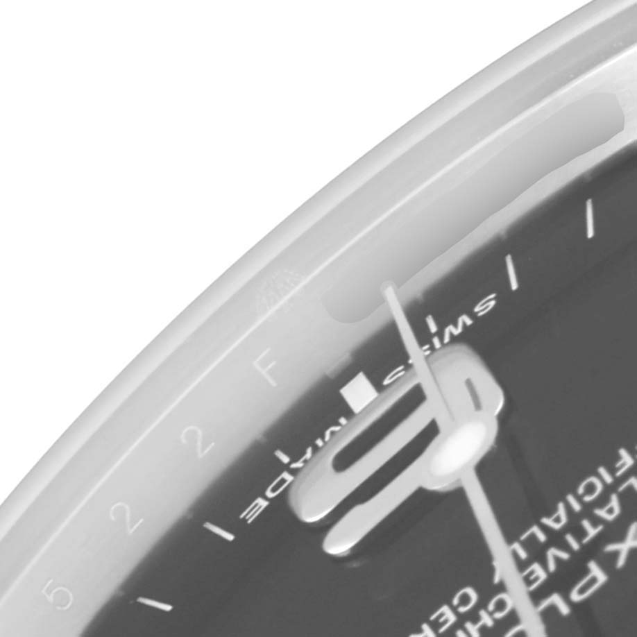 This close-up image features a portion of the dial and hands of a Rolex Explorer 214270 Men
s Stainless Steel Black Dial 214270 Men
s Stainless Steel Black Dial watch.