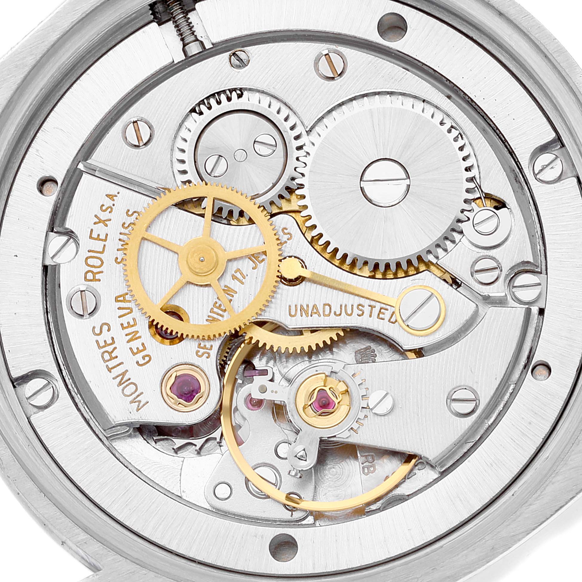 The image shows the inner mechanical movements and gears of the Vintage Collection model by Rolex from a top-down angle.