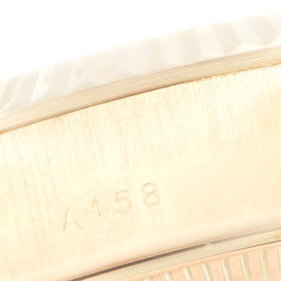 This close-up image shows the side of the case and bezel of a Rolex President 79178 Women
s Yellow Gold Champagne Dial 79178 Women
s Yellow Gold Champagne Dial model, engraved with the number A158.
