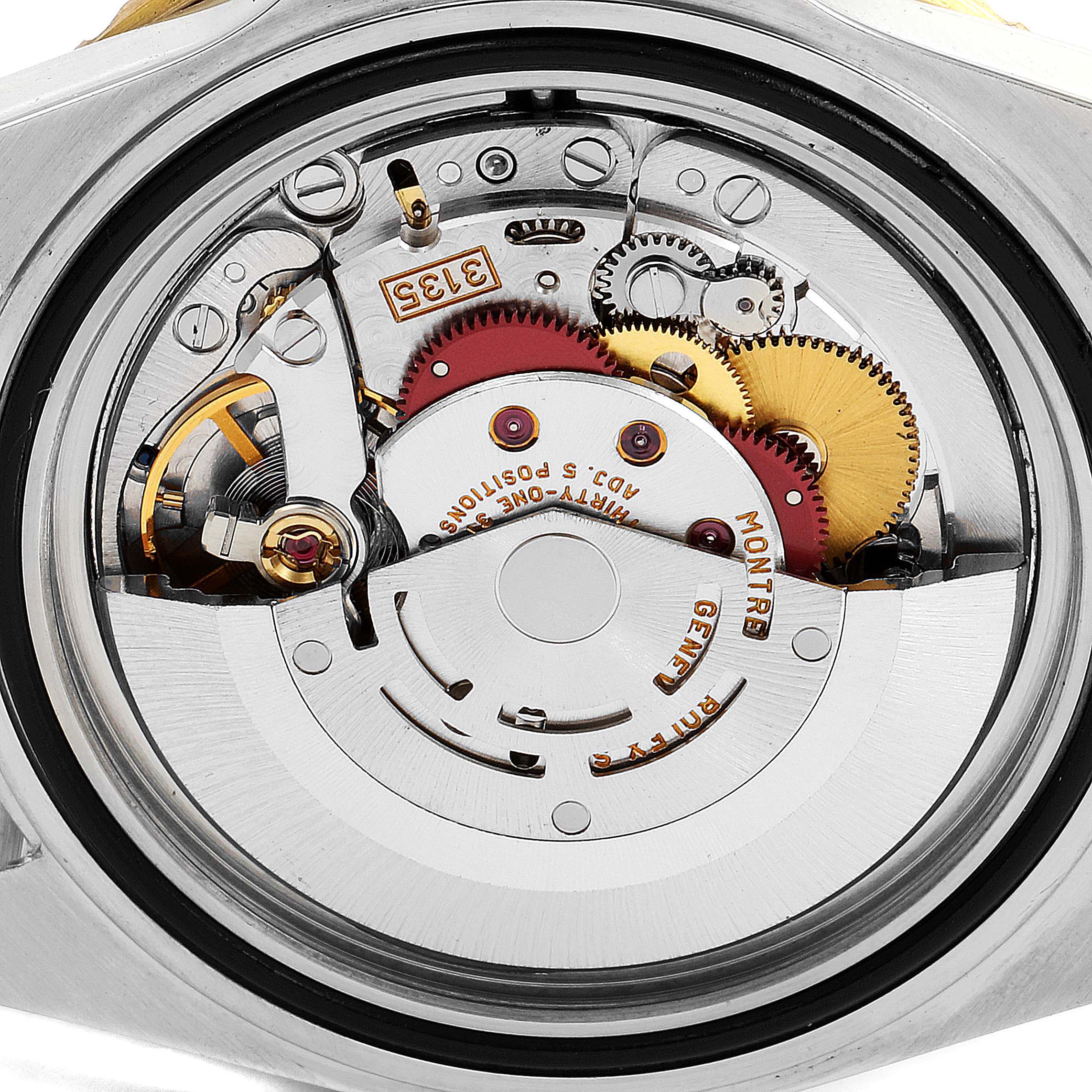 This image shows the internal mechanics and movement of a Rolex Submariner 16613 Men's Steel and Gold (two tone) Black Dial 16613 Men's Steel and Gold (two tone) Black Dial watch from a back angle.