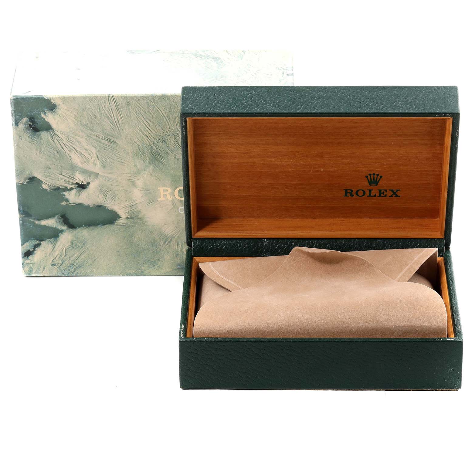 The image shows an open Rolex watch box for a Submariner model, without the watch inside, displaying the interior cushion and outer box.