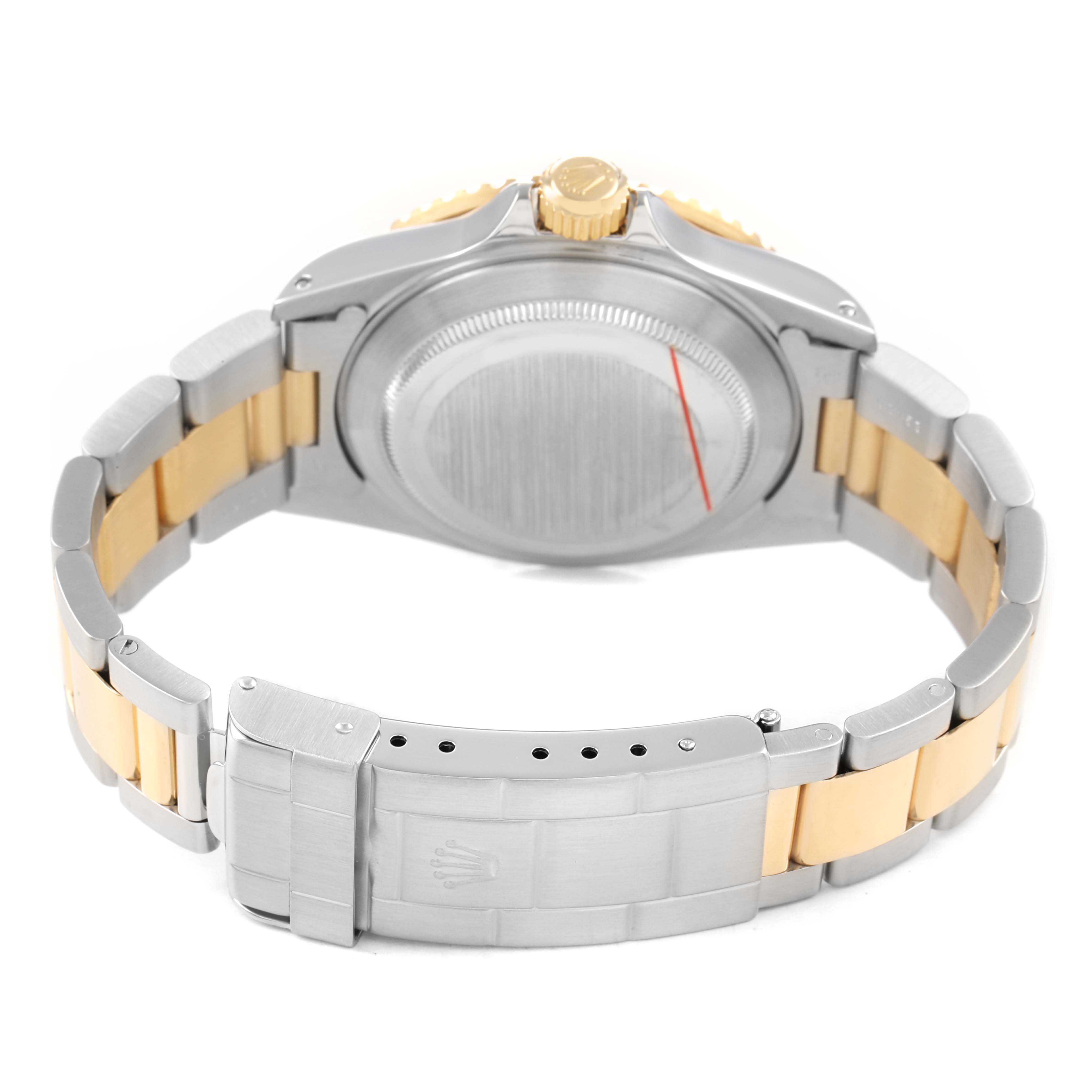 The image shows the back of a Rolex Submariner 16613 Men's Steel and Gold (two tone) Champagne Dial watch, displaying the case back, bracelet, and clasp in two-tone metal.