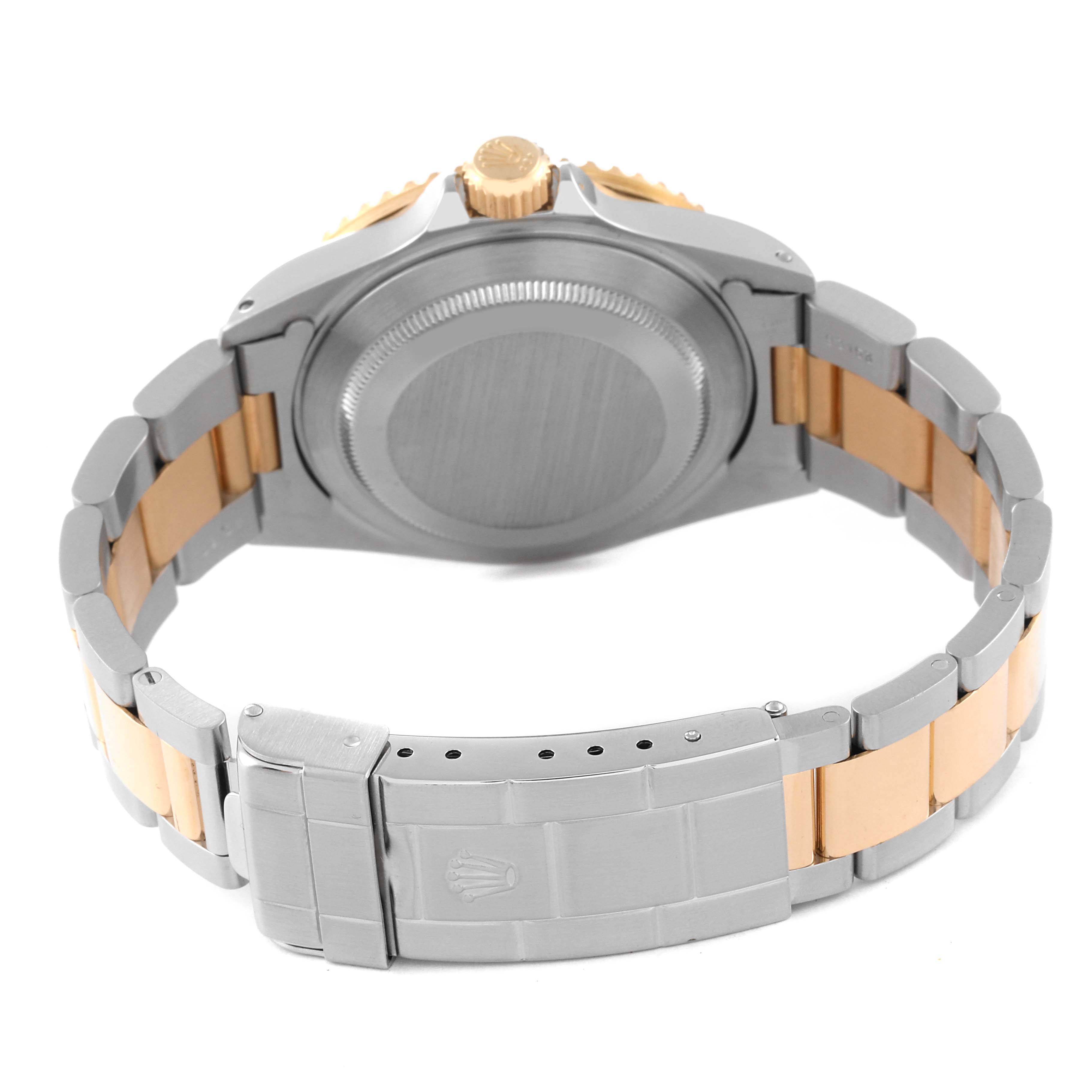 The image shows the back view of a Rolex Submariner 16613 Men's Steel and Gold (two tone) Black Dial 16613 Men's Steel and Gold (two tone) Black Dial, highlighting the case back, bracelet, and clasp.