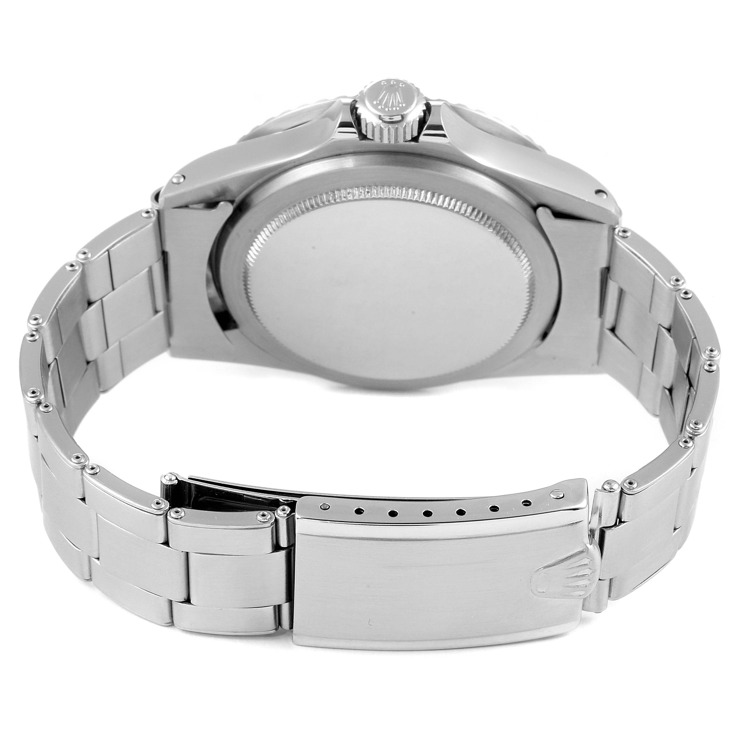 This image shows the back case, crown, and part of the bracelet of the Rolex Vintage Collection 1680 Men's Stainless Steel Black Dial 1680 Men's Stainless Steel Black Dial watch.