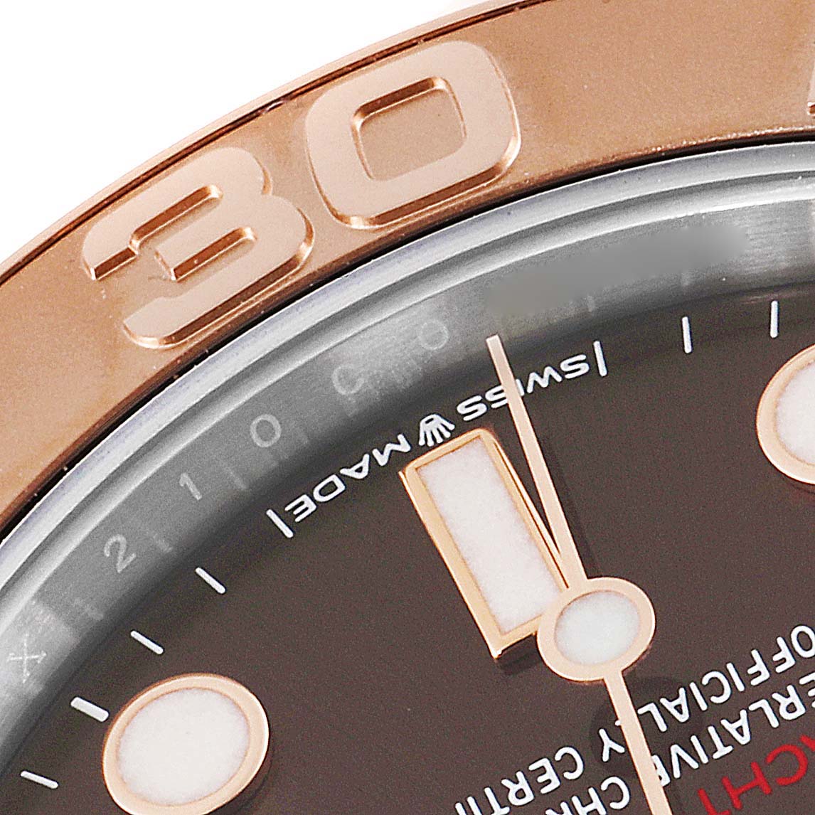The image shows a close-up of the dial and bezel of a Rolex Yacht-Master 268621 Men's Steel and Gold (two tone) Brown Dial 268621 Men's Steel and Gold (two tone) Brown Dial watch, highlighting the "30" marker and the text "Swiss Made."