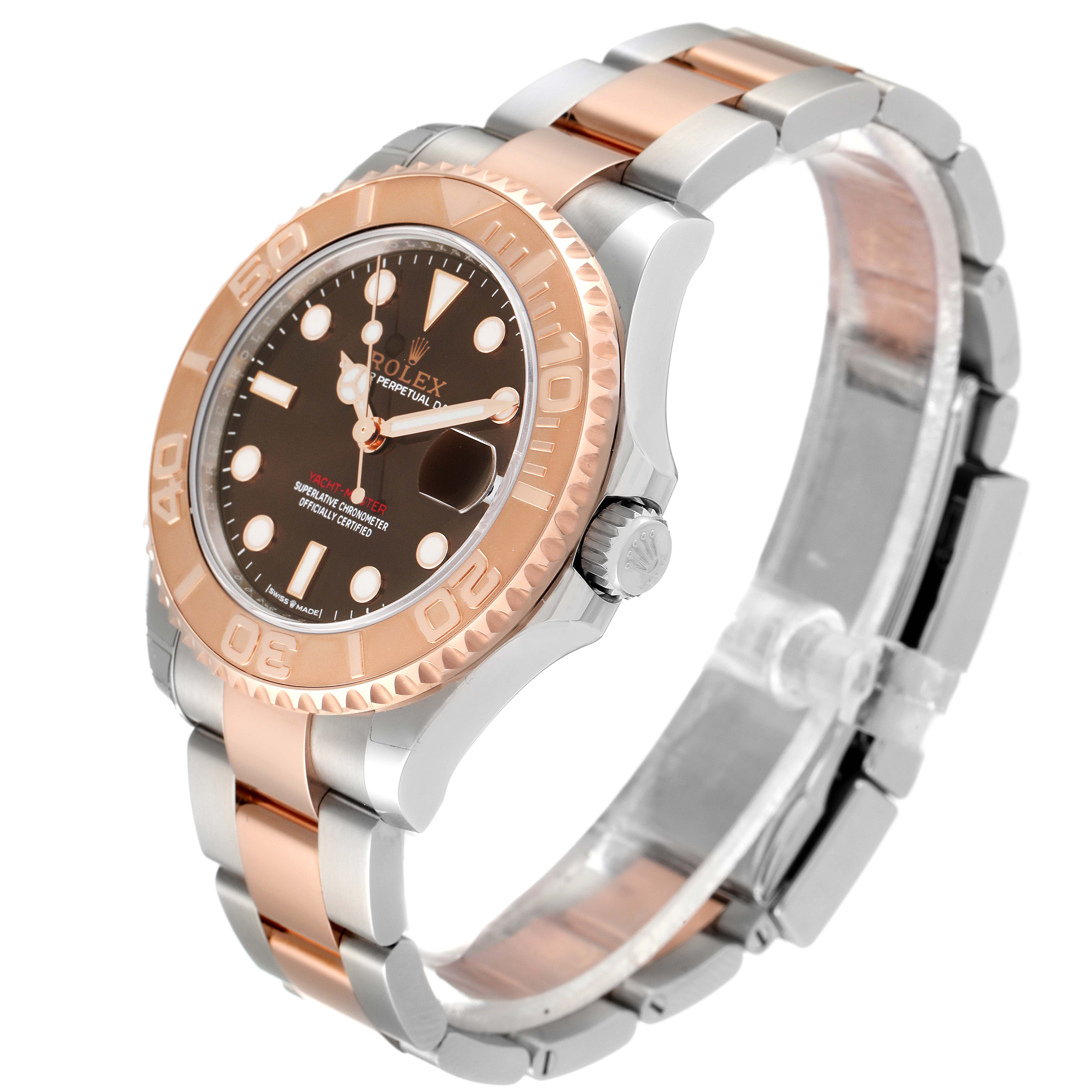 The image shows a side angle of a Rolex Yacht-Master 268621 Men's Steel and Gold (two tone) Brown Dial 268621 Men's Steel and Gold (two tone) Brown Dial watch, highlighting its bezel, dial, and two-tone bracelet.