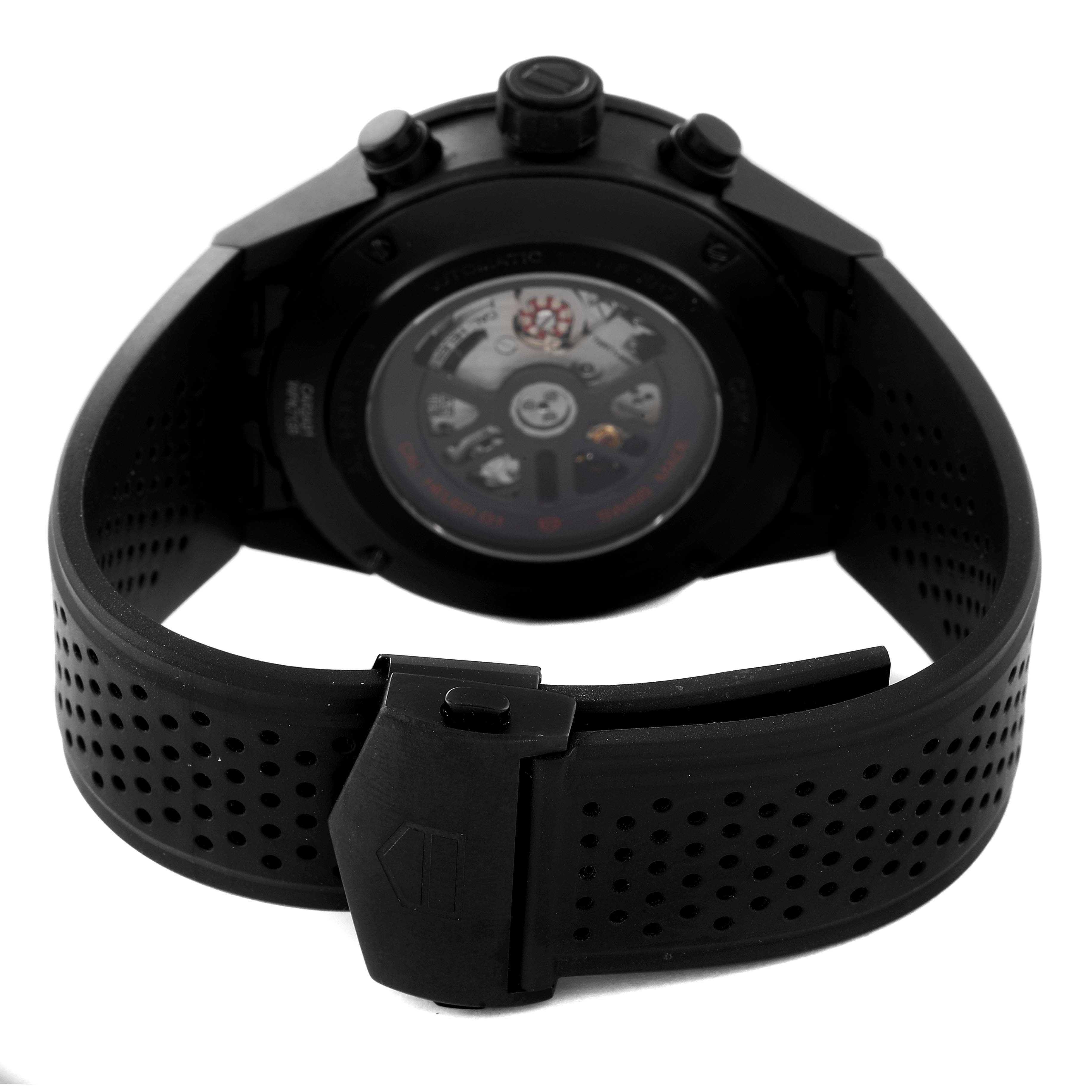 The image shows a rear view of a Tag Heuer Carrera CAR2A91 Men's Ceramic Black Dial CAR2A91 Men's Ceramic Black Dial watch, highlighting the back case, perforated rubber strap, and clasp.