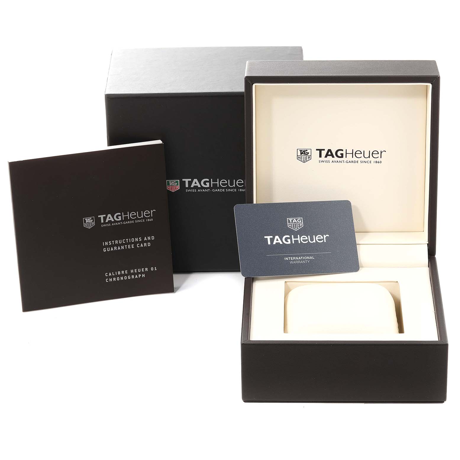 The image shows the packaging, instruction booklet, guarantee card, and empty watch case for the Tag Heuer Carrera CAR2A91 Men's Ceramic Black Dial CAR2A91 Men's Ceramic Black Dial model.