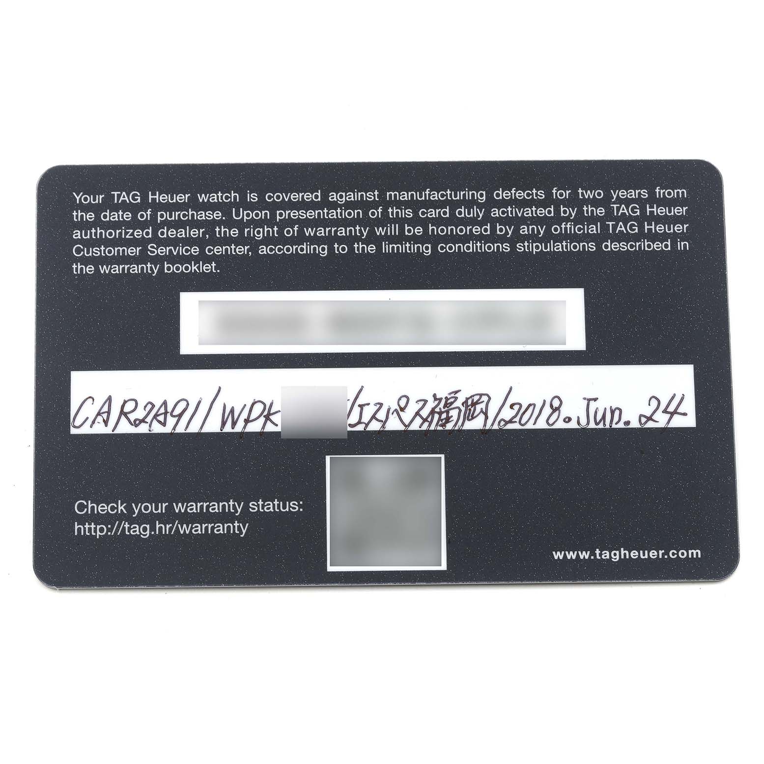 This image shows a warranty card for a Carrera model Tag Heuer watch, providing warranty terms and check status information.