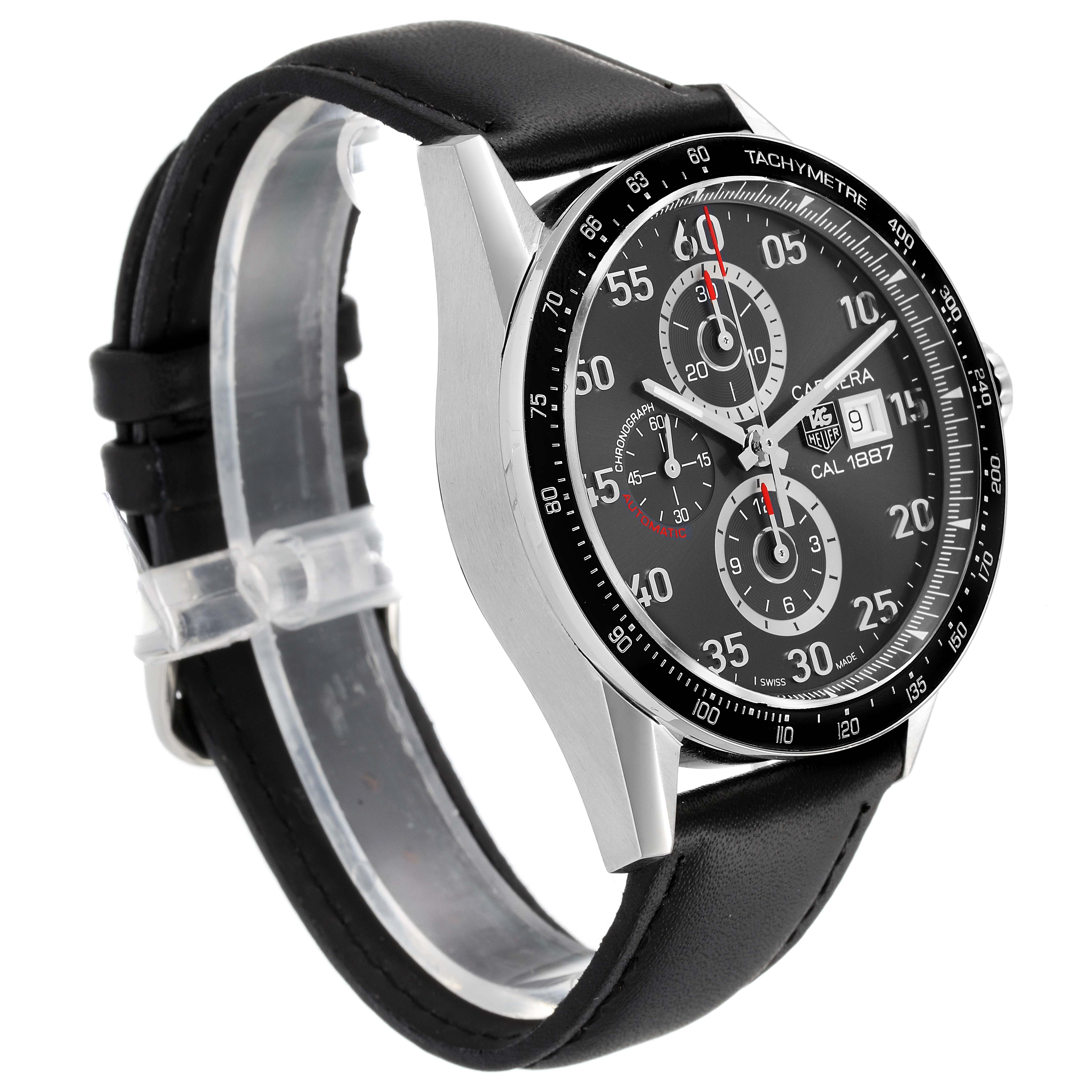 This image shows the Tag Heuer Carrera CAR2A11.BA0799 Men's Stainless Steel Grey Dial CAR2A11.BA0799 Men's Stainless Steel Grey Dial watch at a three-quarter angle, highlighting the black dial, chronograph, and leather strap.