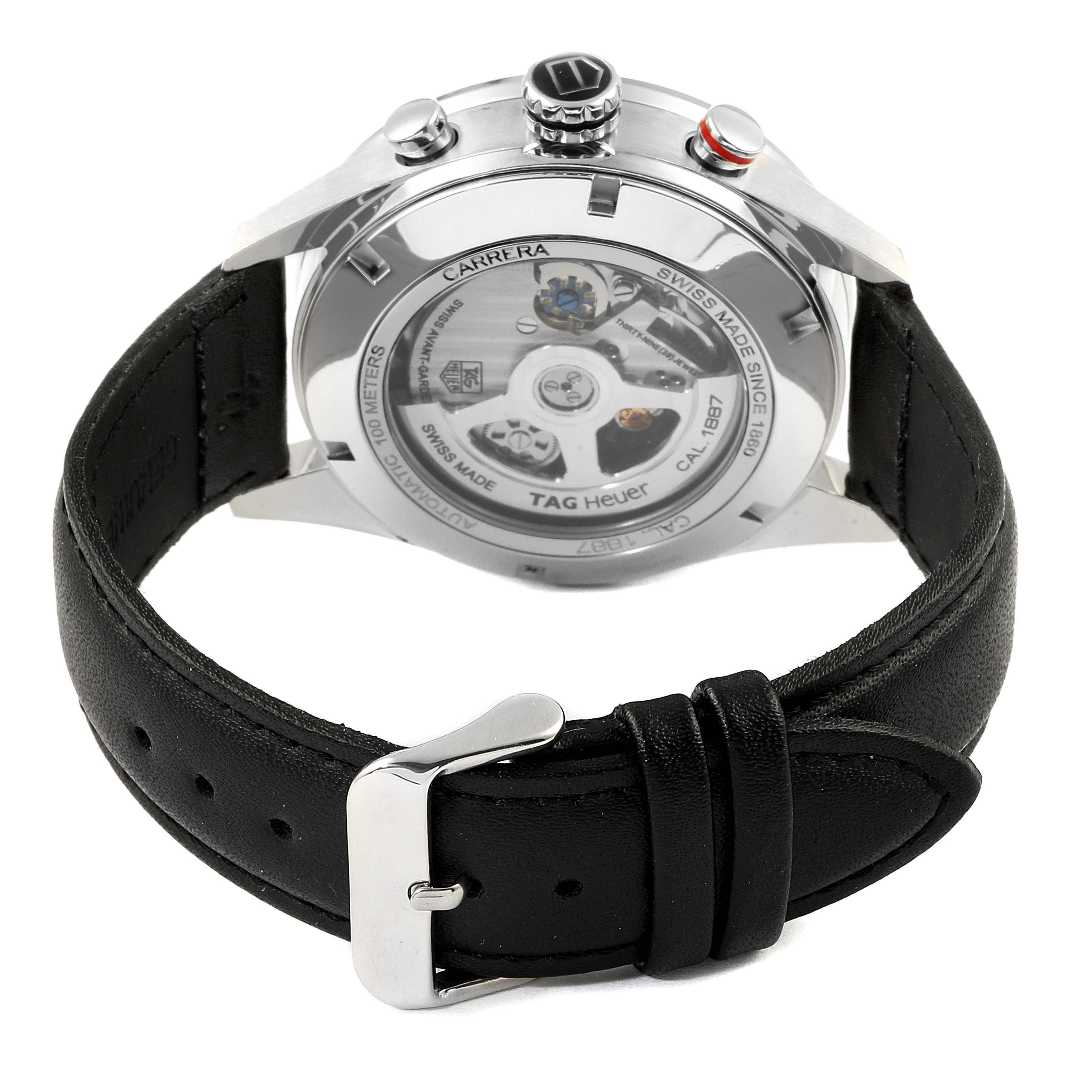 The image shows the back view of a Tag Heuer Carrera CAR2A11.BA0799 Men's Stainless Steel Grey Dial CAR2A11.BA0799 Men's Stainless Steel Grey Dial watch, highlighting its transparent case back and leather strap.