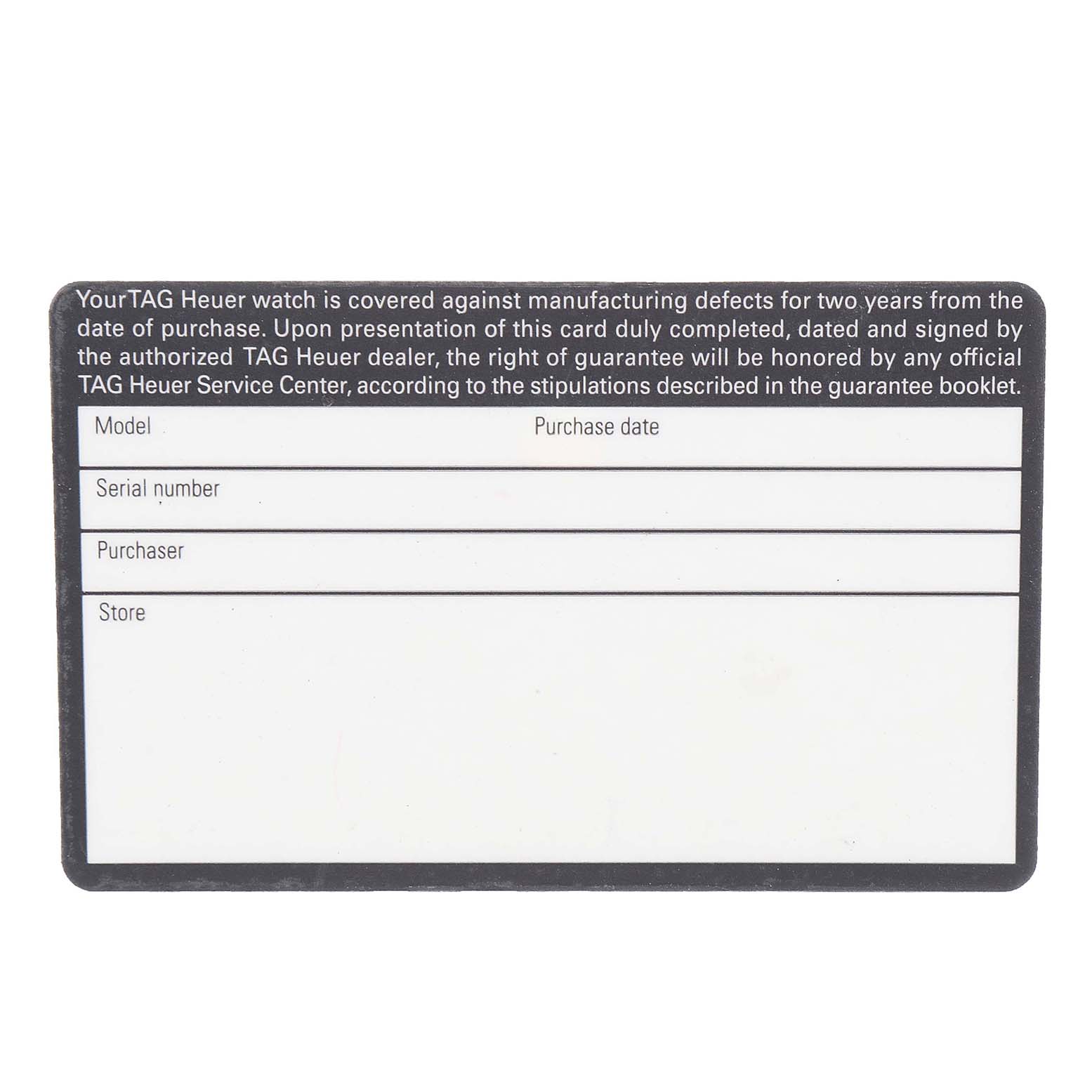This is a Tag Heuer guarantee card for the Link model showing warranty information with spaces for model, serial number, purchaser, and store details.