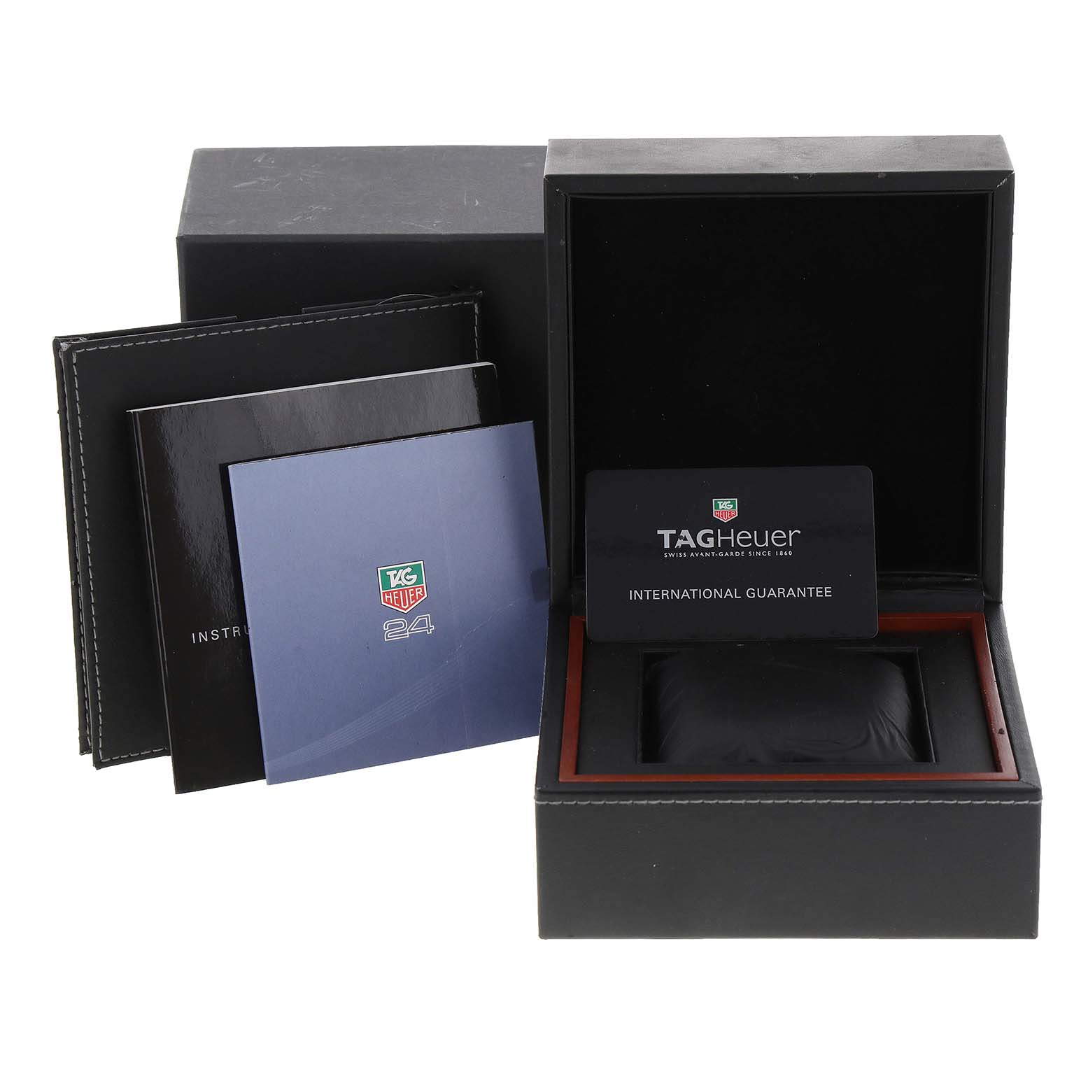 The image shows the packaging, guarantee card, and instruction manuals for a Tag Heuer Link CJF2150.BB0595 Men's Steel and Gold (two tone) Silver Dial CJF2150.BB0595 Men's Steel and Gold (two tone) Silver Dial watch.