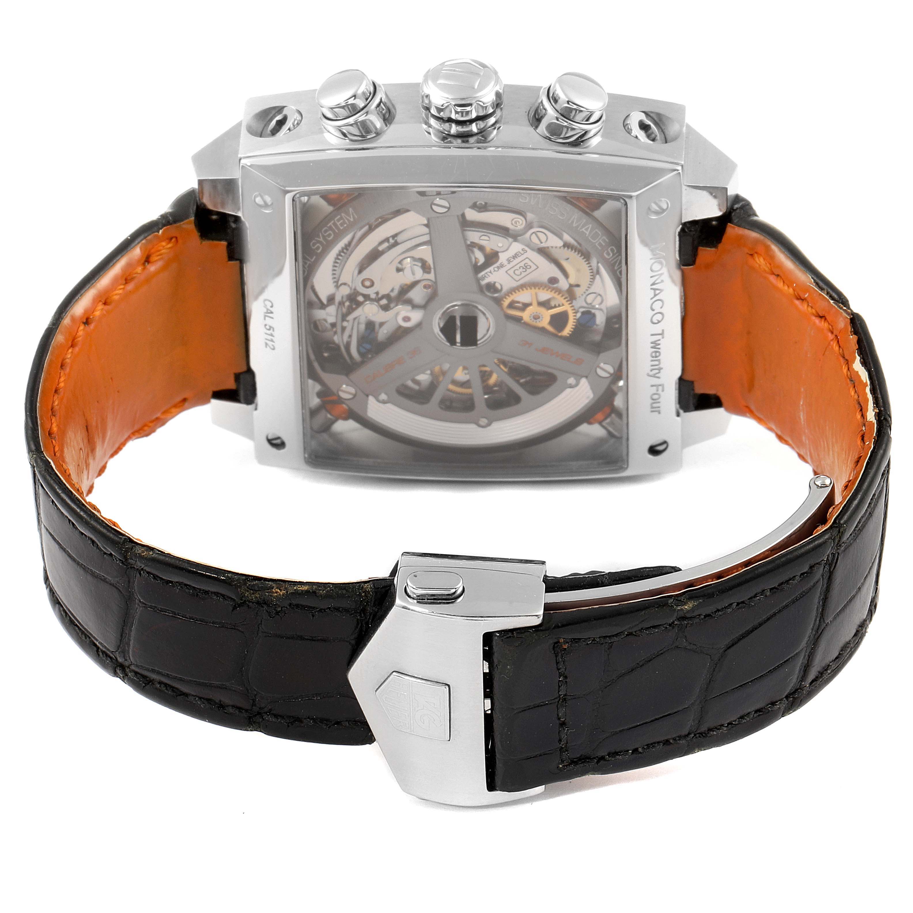 The image shows the back angle of the Tag Heuer Monaco CAL5112.FC6298 Men's Stainless Steel Grey Dial CAL5112.FC6298 Men's Stainless Steel Grey Dial watch, highlighting its movement and clasp.