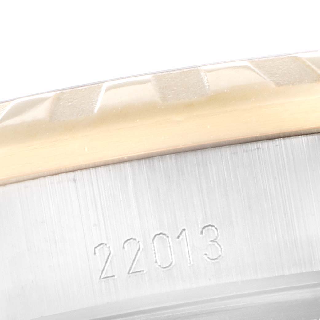 The image shows a close-up of the bezel and case side of a Tudor Classic 22013 Women's Steel and Gold (two tone) Champagne Dial 22013 Women's Steel and Gold (two tone) Champagne Dial model watch, focusing on the engraved reference number 22013.