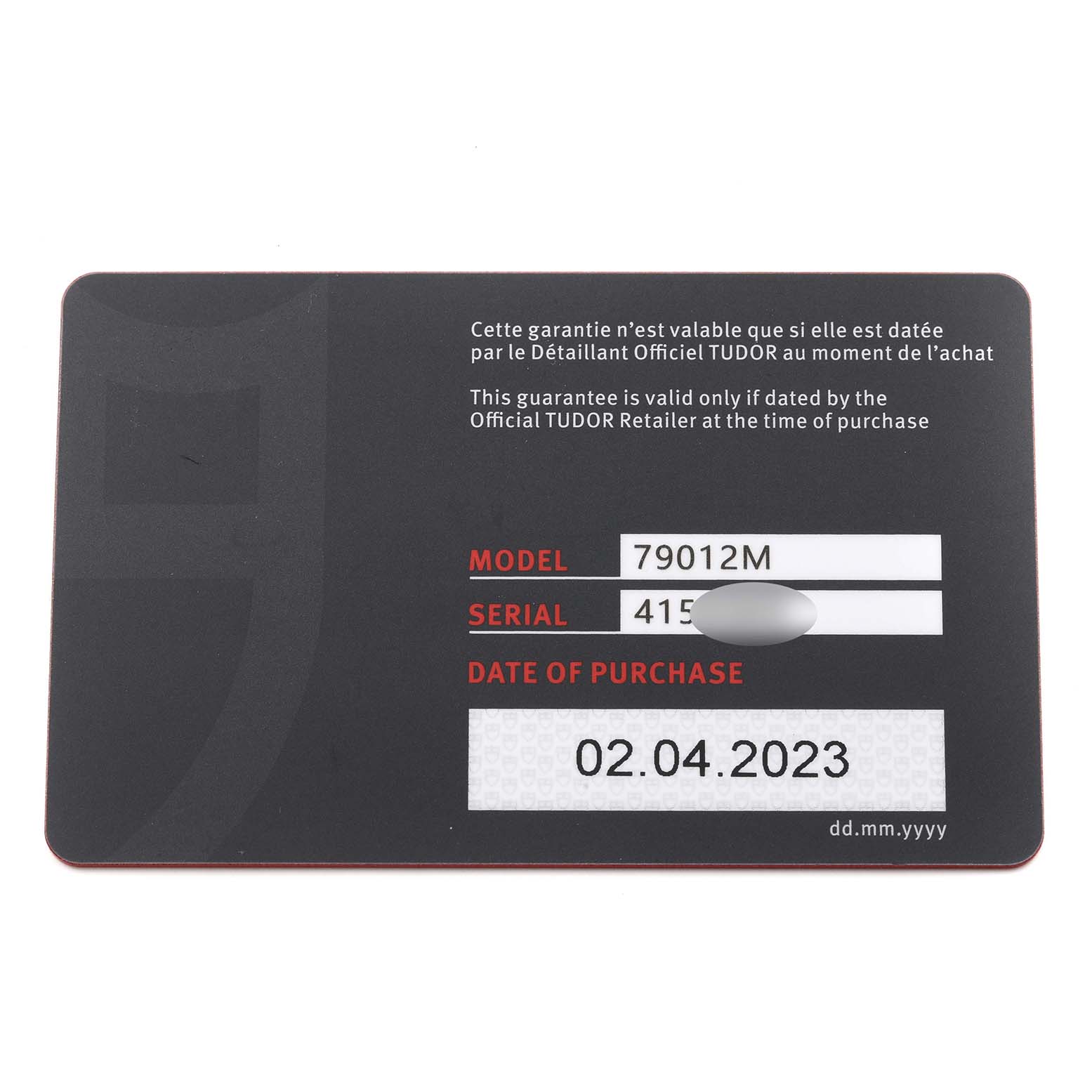 This image shows the warranty card for the Heritage Black Bay model by Tudor, detailing the model, serial number, and purchase date.