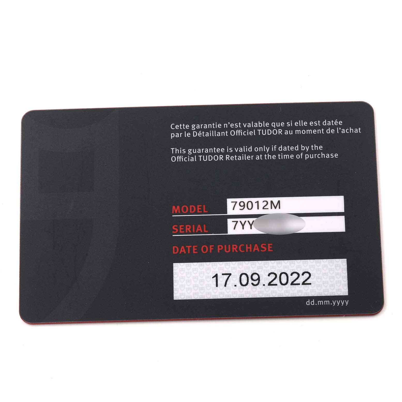 This image shows the warranty card for the Tudor Heritage Black Bay M79012M-0001 Men's Bronze Brown Dial M79012M-0001 Men's Bronze Brown Dial, model 79012M, with purchase details.