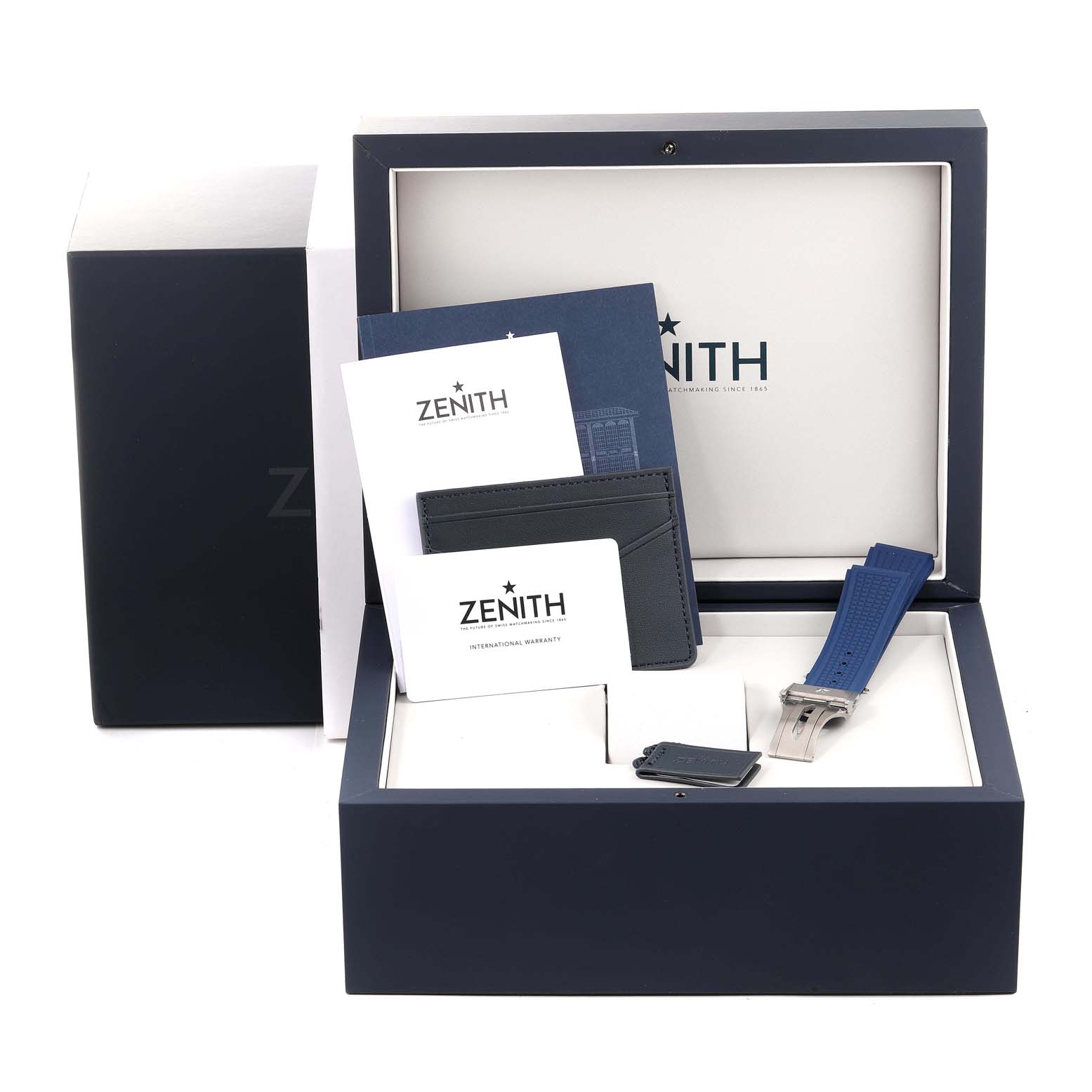 The Zenith Defy 95.9002.9004/78.M9000 Men's Titanium Grey Dial 95.9002.9004/78.M9000 Men's Titanium Grey Dial watch box shows its packaging, booklets, warranty card, and an additional blue strap.