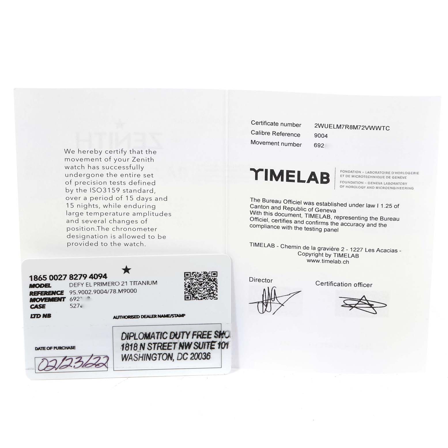 This image shows certification documents and a warranty card for the Zenith Defy 95.9002.9004/78.M9000 Men's Titanium Grey Dial 95.9002.9004/78.M9000 Men's Titanium Grey Dial El Primero 21 Titanium watch, displayed from a top view.