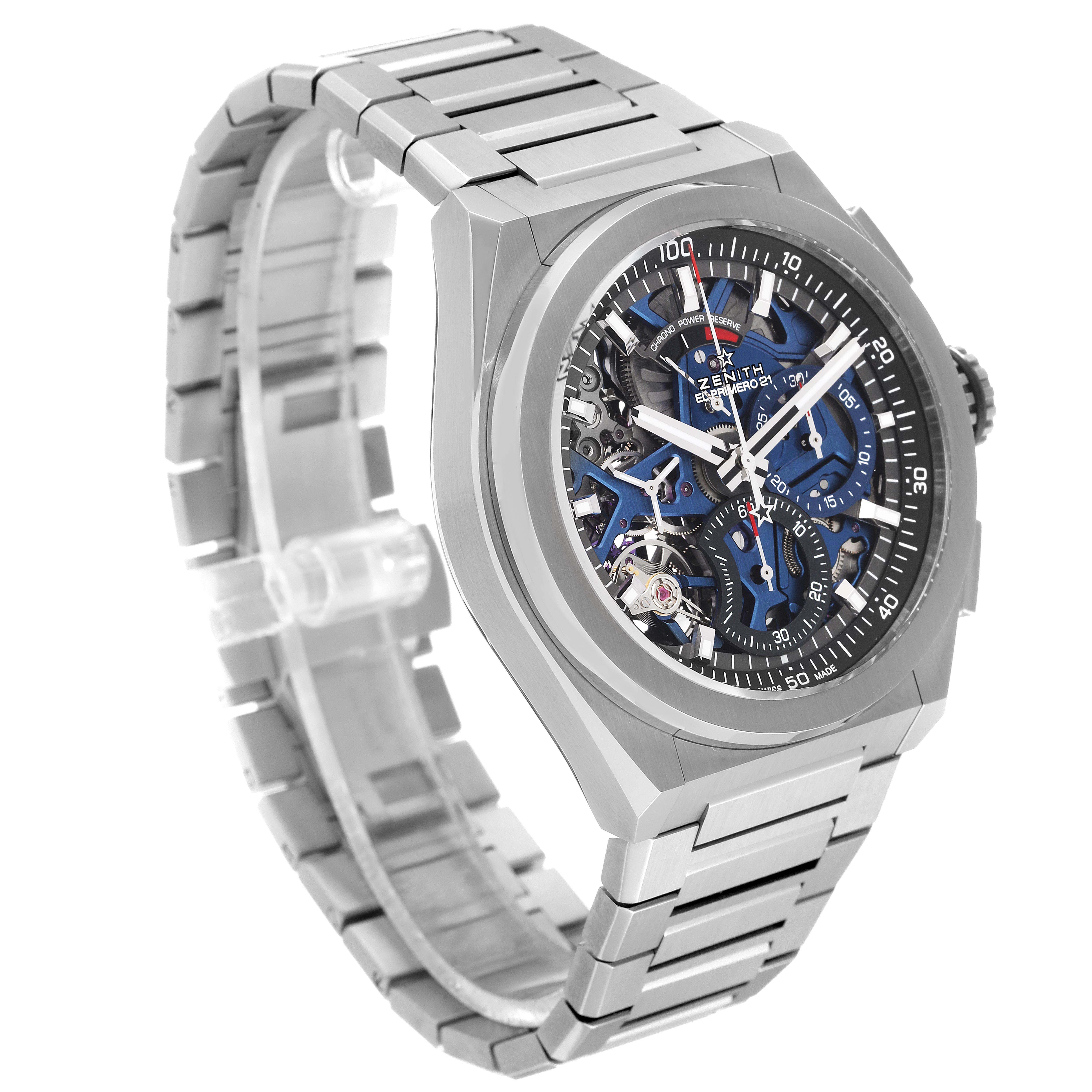 The image shows a Zenith Defy 95.9002.9004/78.M9000 Men's Titanium Grey Dial 95.9002.9004/78.M9000 Men's Titanium Grey Dial model watch from a three-quarter angle, highlighting its dial, case, and metal bracelet.