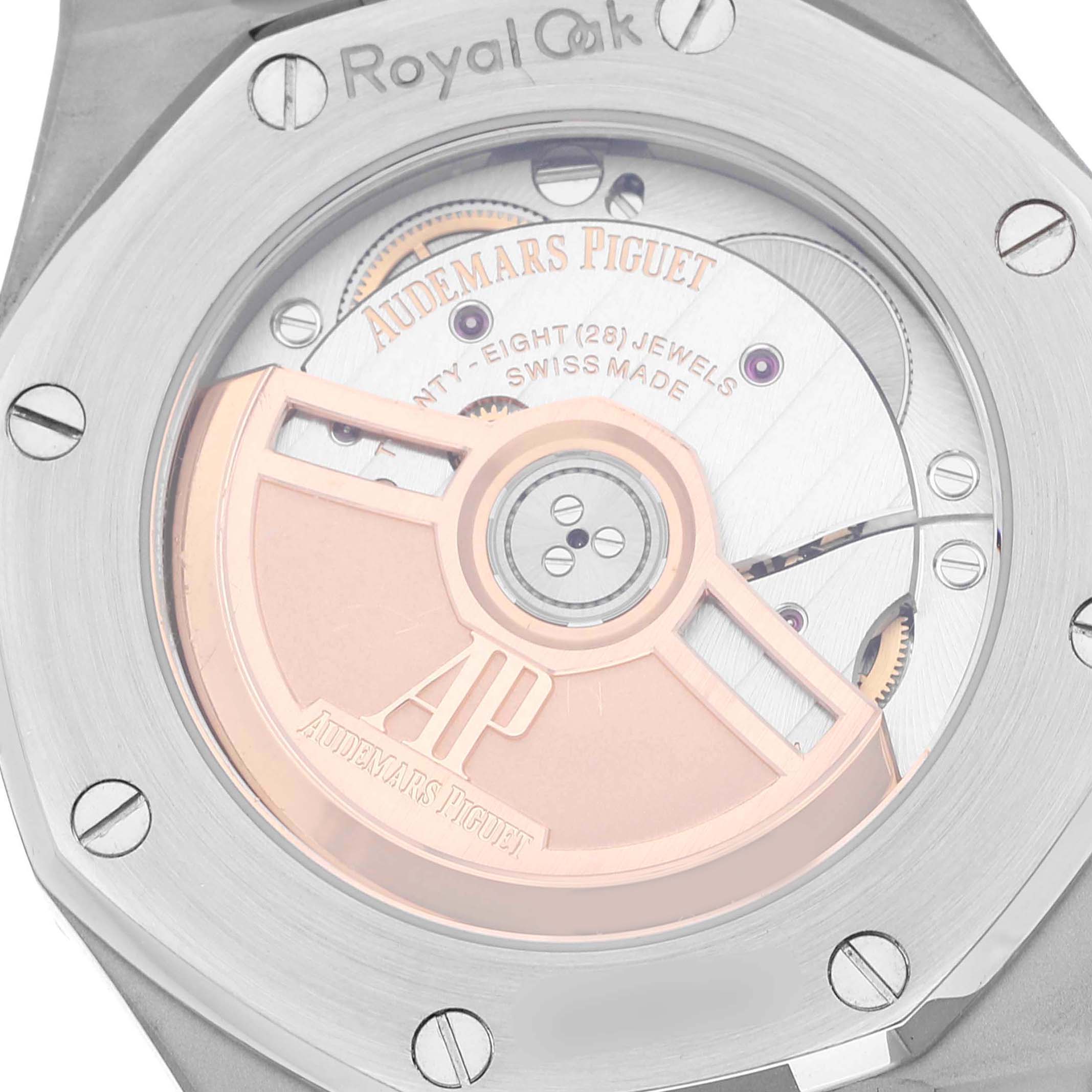 The image shows the back view of the Audemars Piguet Royal Oak 15451ST.ZZ.1256ST.03 Men's Stainless Steel Blue Dial 15451ST.ZZ.1256ST.03 Men's Stainless Steel Blue Dial watch, displaying its intricate movement and rotor.