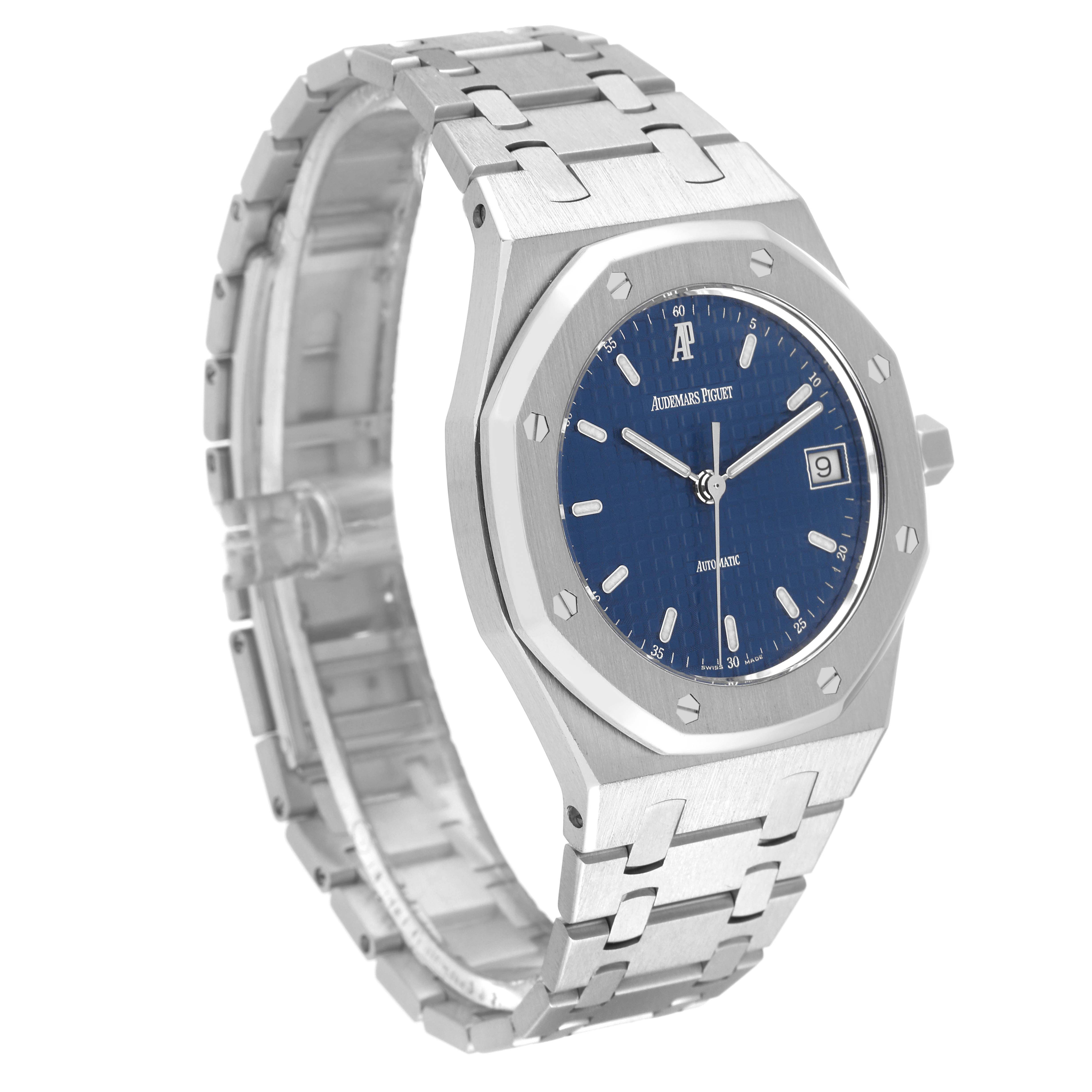 The image shows an angled view of the Audemars Piguet Royal Oak 14790ST.OO.0789ST.09 Men's Stainless Steel Blue Dial 14790ST.OO.0789ST.09 Men's Stainless Steel Blue Dial watch, highlighting its bracelet, case, and blue dial.