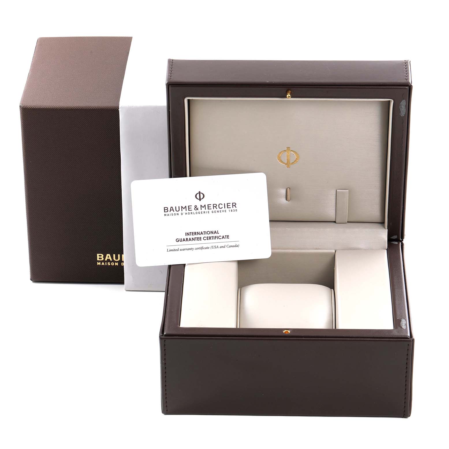 The image shows the Baume & Mercier Capeland M0A10107 Men's Rose Gold Silver Dial M0A10107 Men's Rose Gold Silver Dial watch packaging, including the box and an international guarantee certificate.
