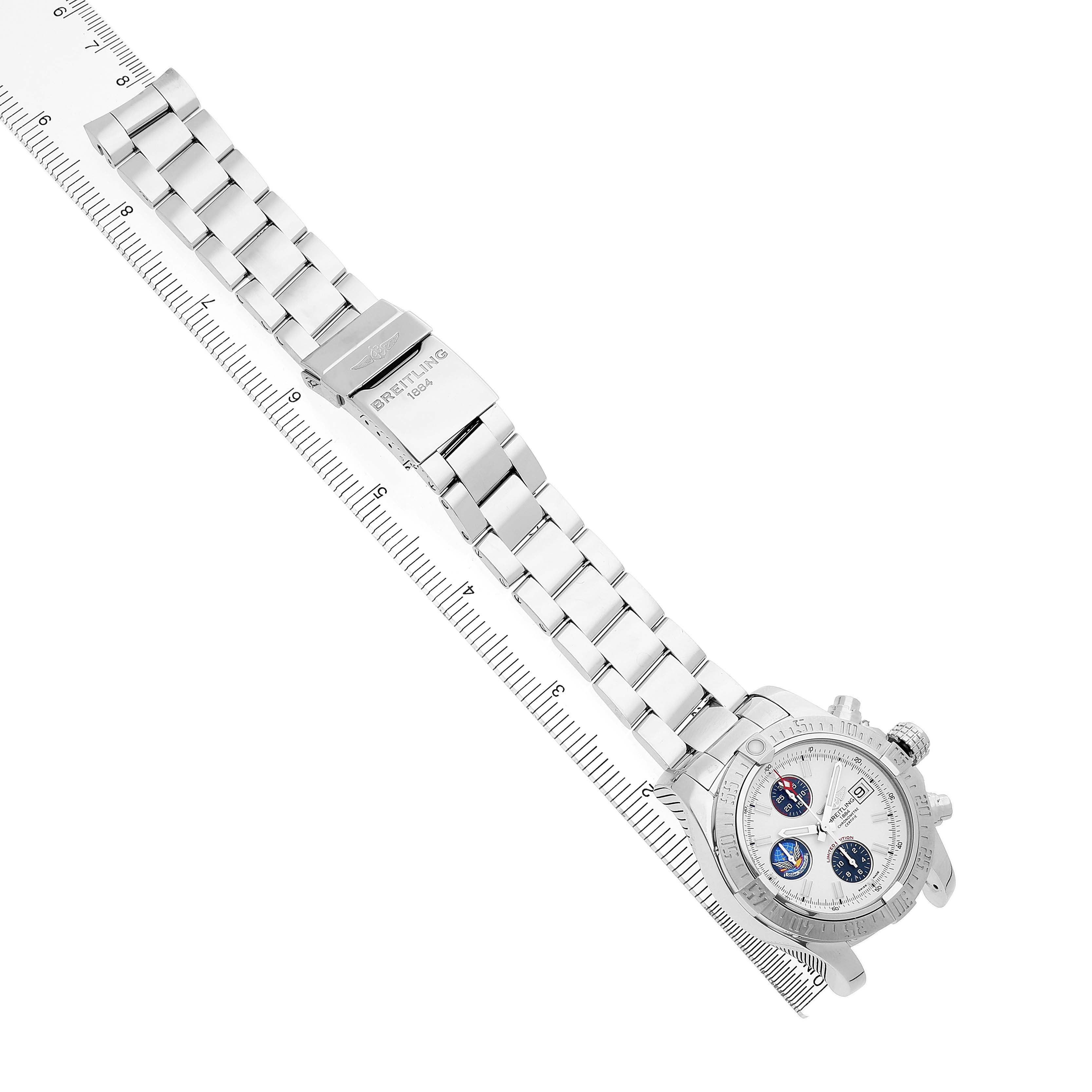 The Breitling Avenger A13381 Men's Stainless Steel White Dial watch is shown from an overhead angle, displaying its band, clasp, and dial with visible subdials.