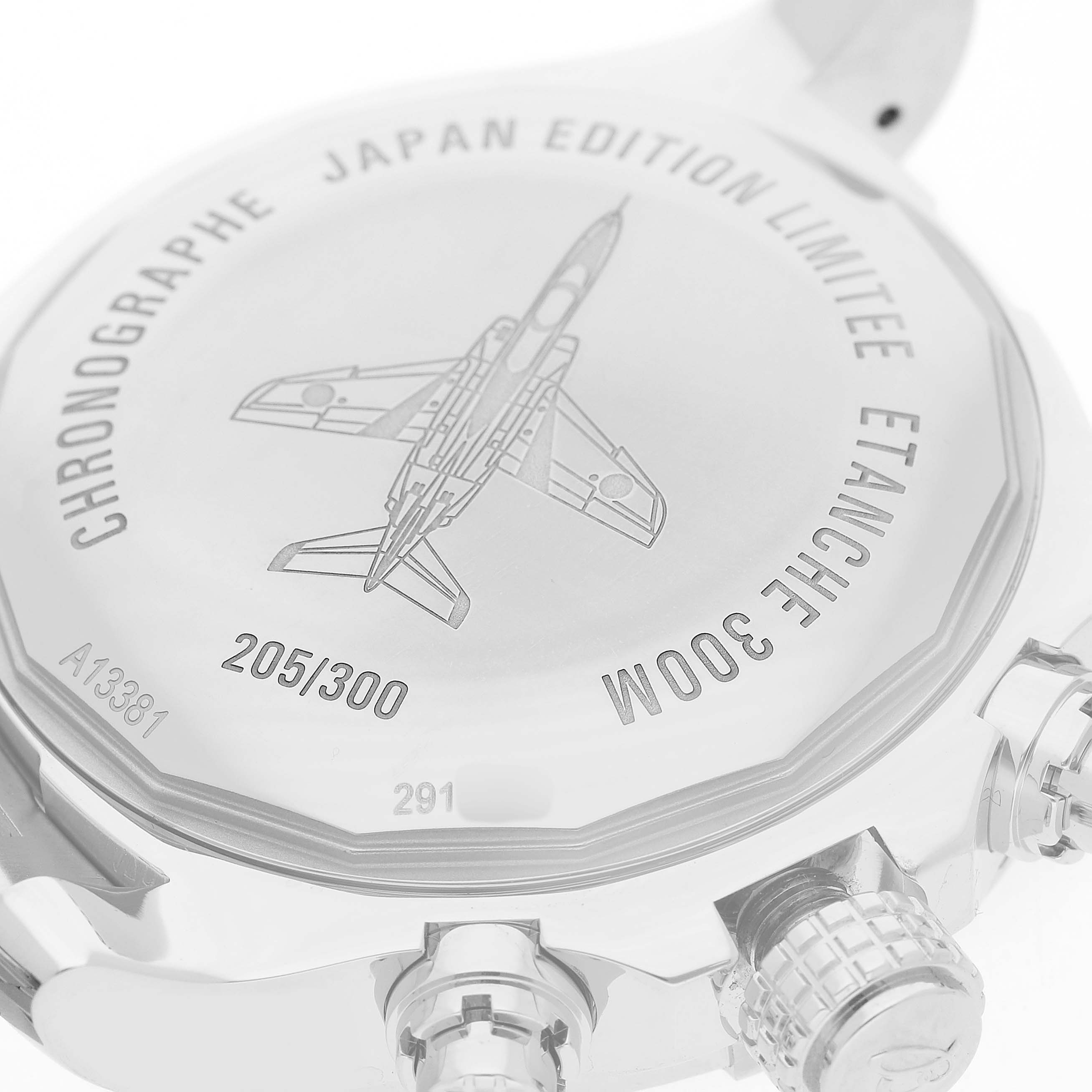 The image shows the back of a Breitling Avenger A13381 Men's Stainless Steel White Dial watch, highlighting the engraved plane, edition information, and waterproofing details.