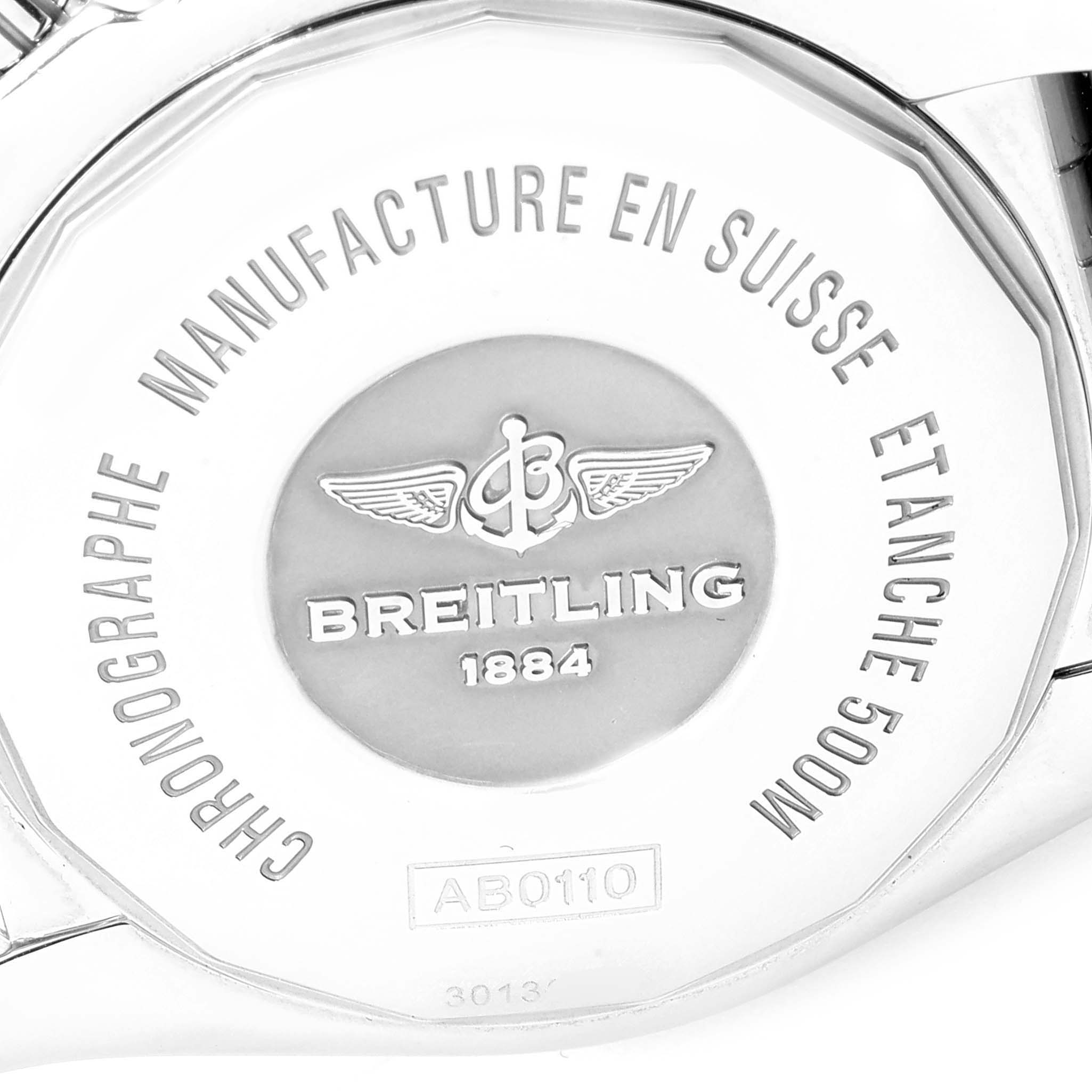 The image shows the back case of a Breitling Chronomat AB0110 Men's Stainless Steel Brown Dial AB0110 Men's Stainless Steel Brown Dial watch, displaying branding and specifications.