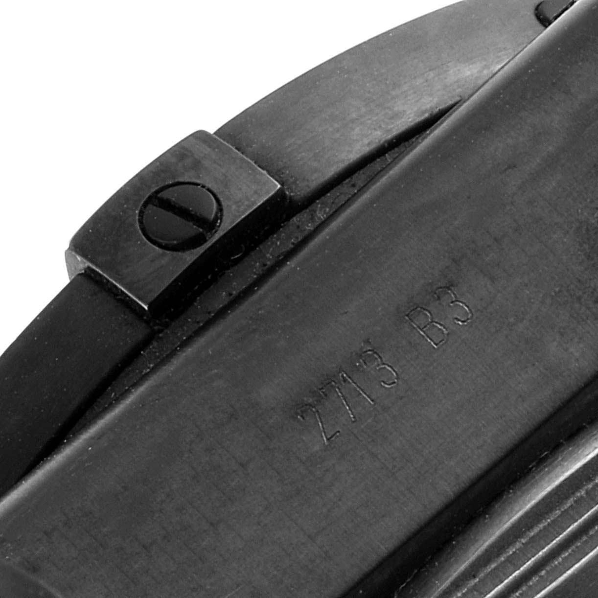 Close-up of the strap attachment and engraved serial number on a Breitling Chronomat MB041310/BC78-155S Men's Stainless Steel Black Dial MB041310/BC78-155S Men's Stainless Steel Black Dial watch.