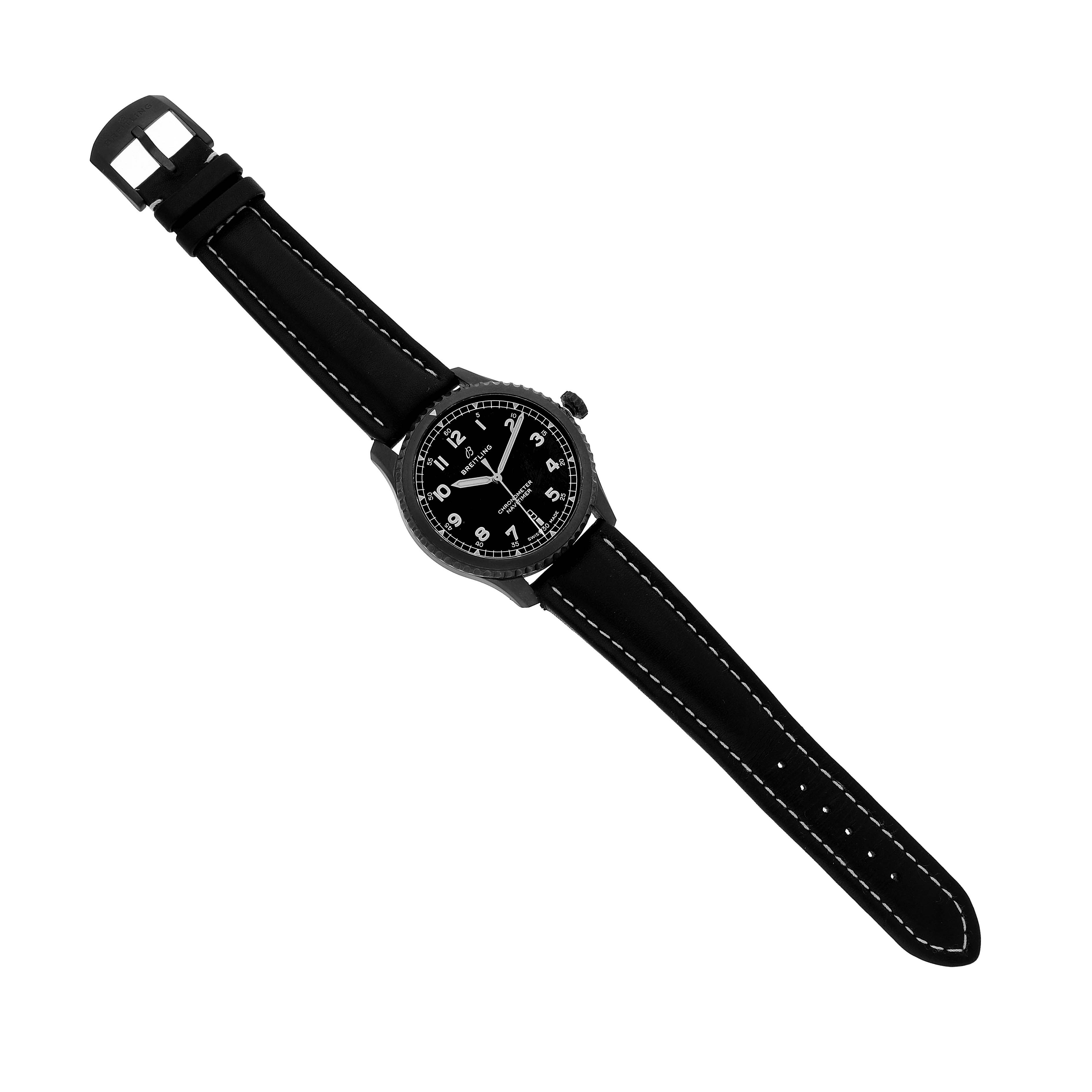 The Breitling Navitimer M17314 Men's Stainless Steel Black Dial watch is shown from a top-down angle, displaying the face, bezel, crown, and strap.