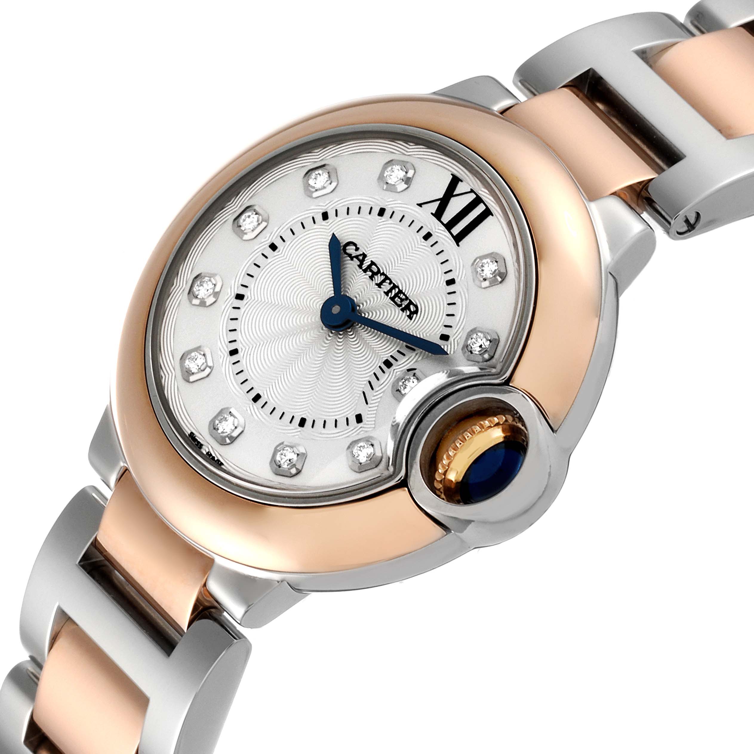 The image shows a close-up angle of the face and bracelet of a Cartier Ballon Bleu W3BB0005 Women
s Steel and Gold (two tone) Silver Dial W3BB0005 Women
s Steel and Gold (two tone) Silver Dial watch.