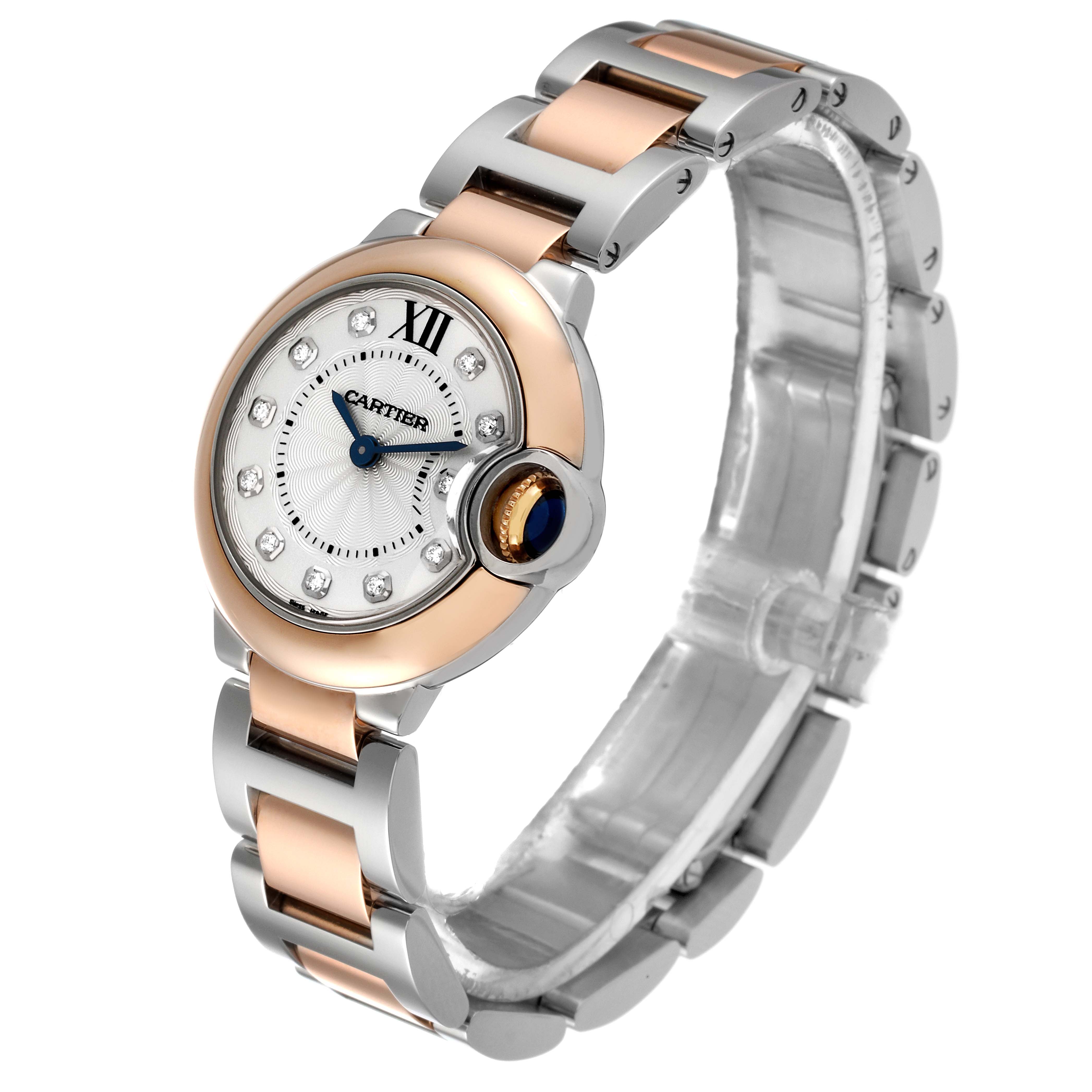 The image shows a Ballon Bleu model by Cartier viewed from a front angle, highlighting its round face, crown, and two-tone bracelet.
