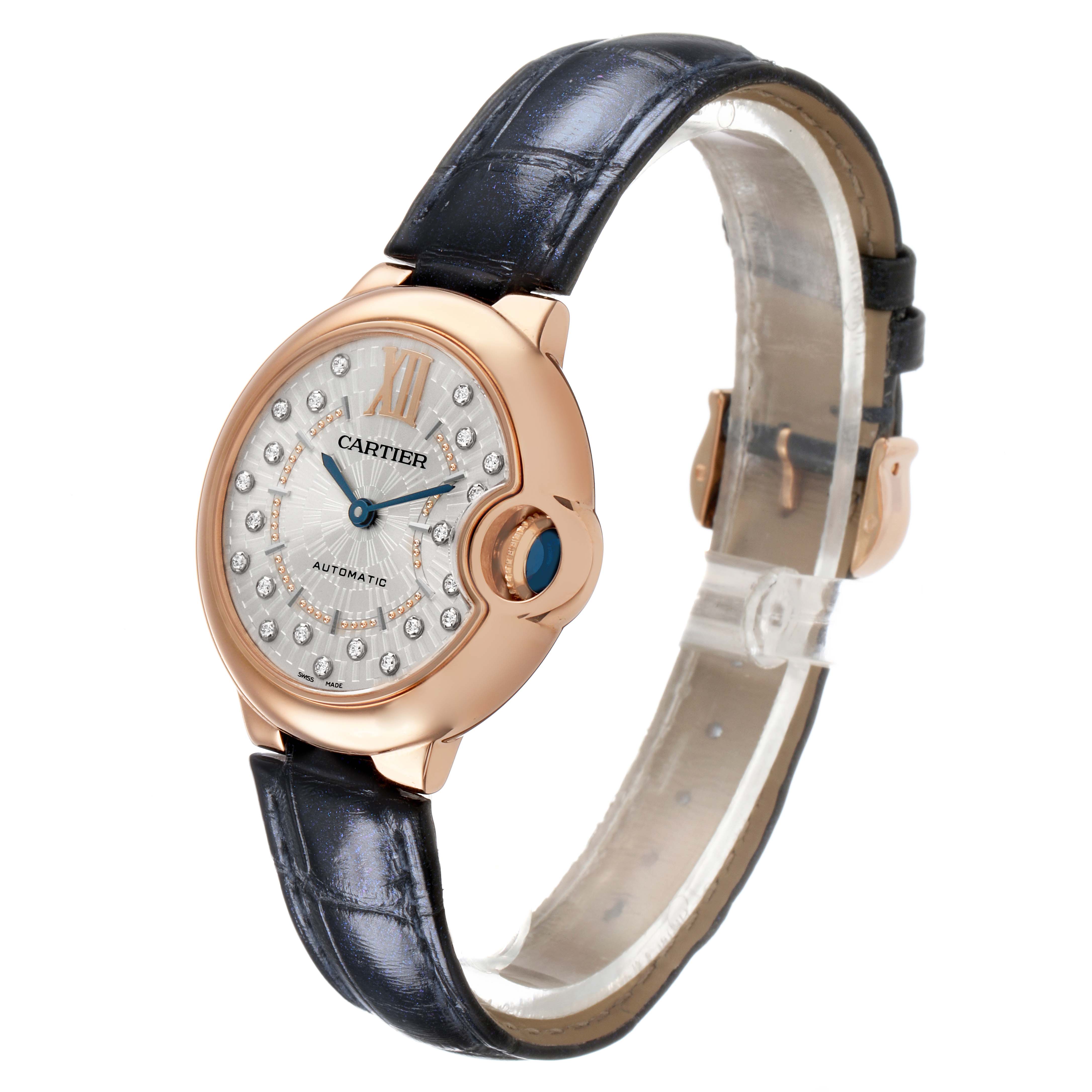 The Cartier Ballon Bleu WGBB0052 Women's Rose Gold Silver Dial watch is shown at a three-quarter angle, displaying the dial, crown, and strap.