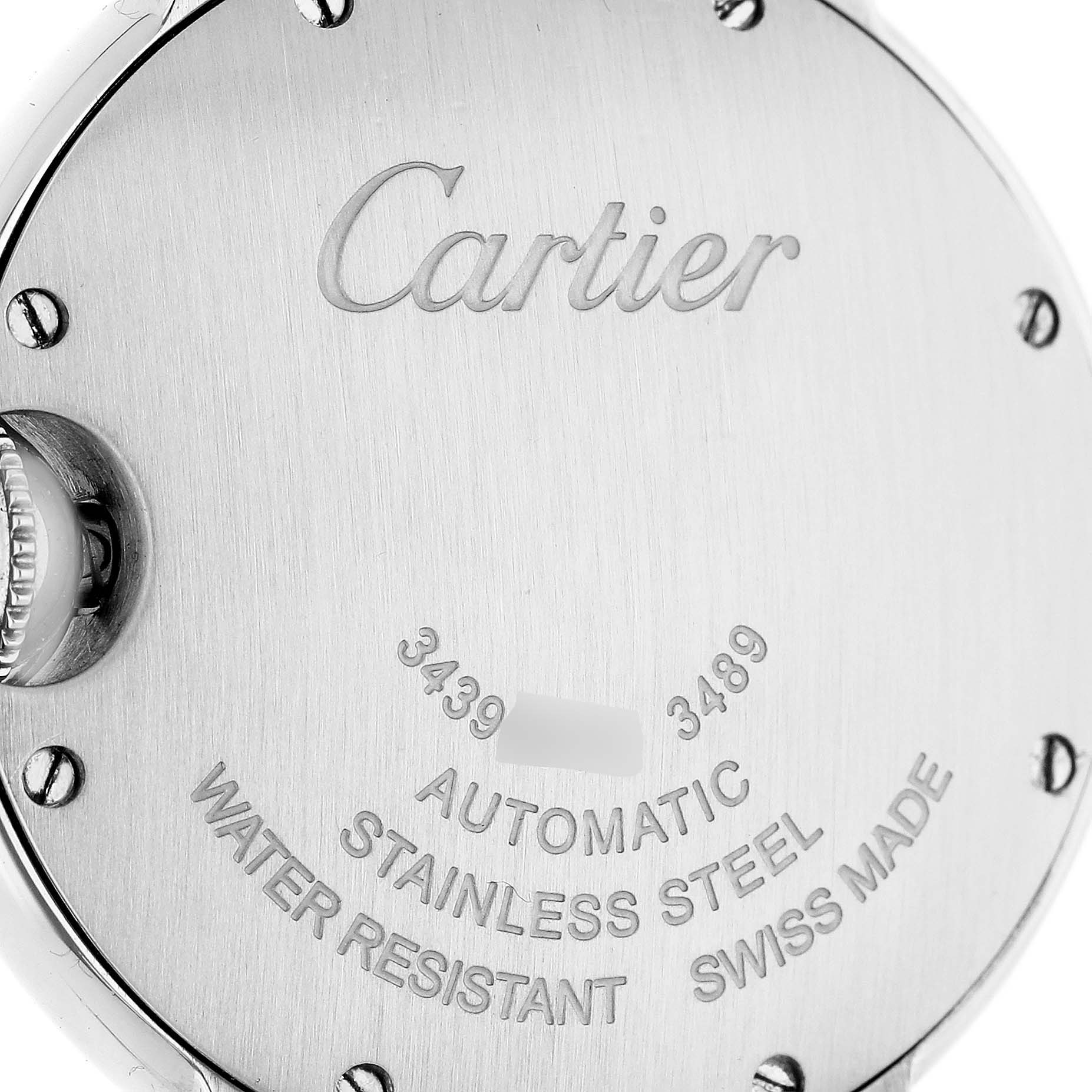 The image shows the back case of a Cartier Ballon Bleu W6920071 Women's Stainless Steel Silver Dial watch, highlighting the Cartier engraving and specifications.