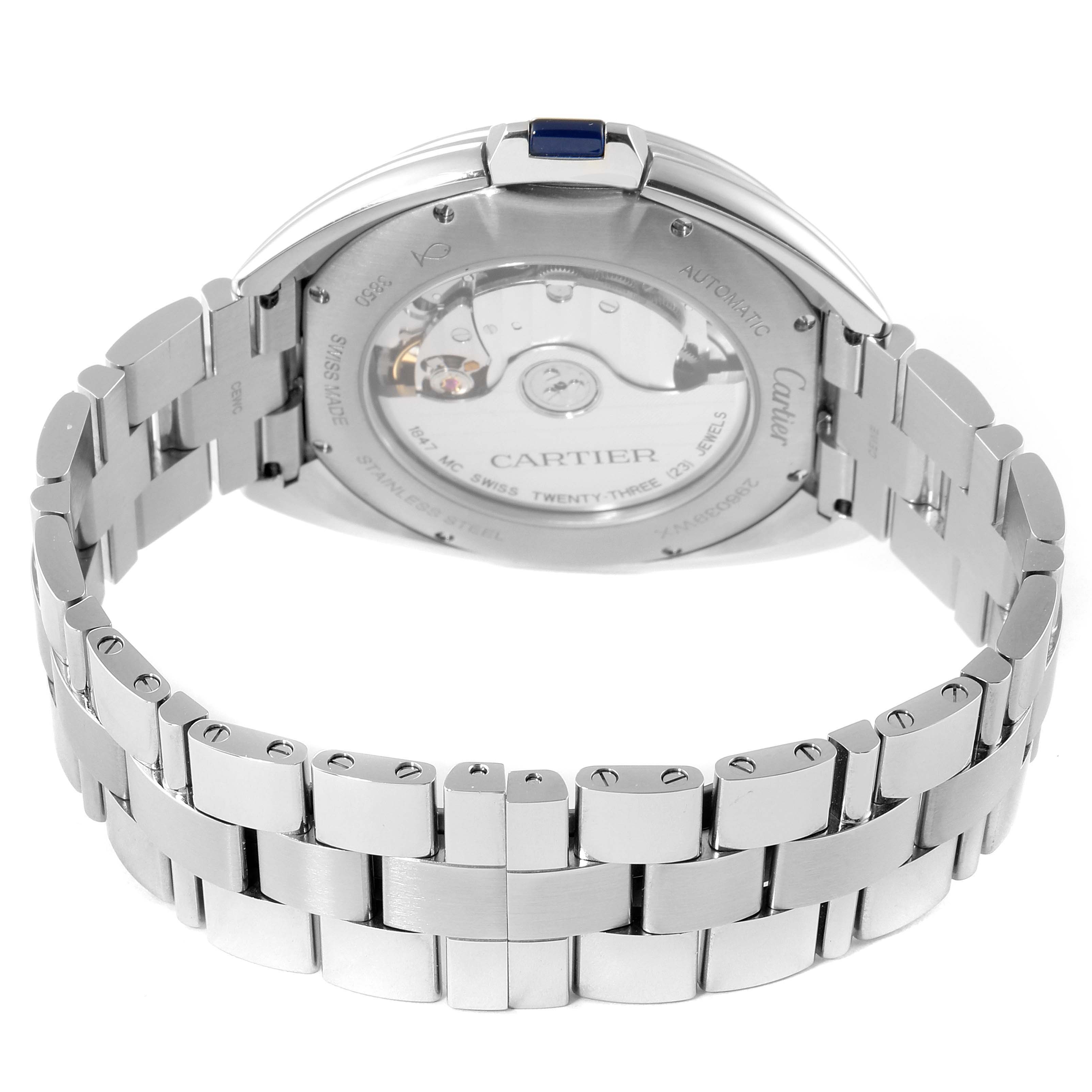 The image shows the back view of the Cartier Clé watch, displaying its stainless steel bracelet and visible automatic movement.