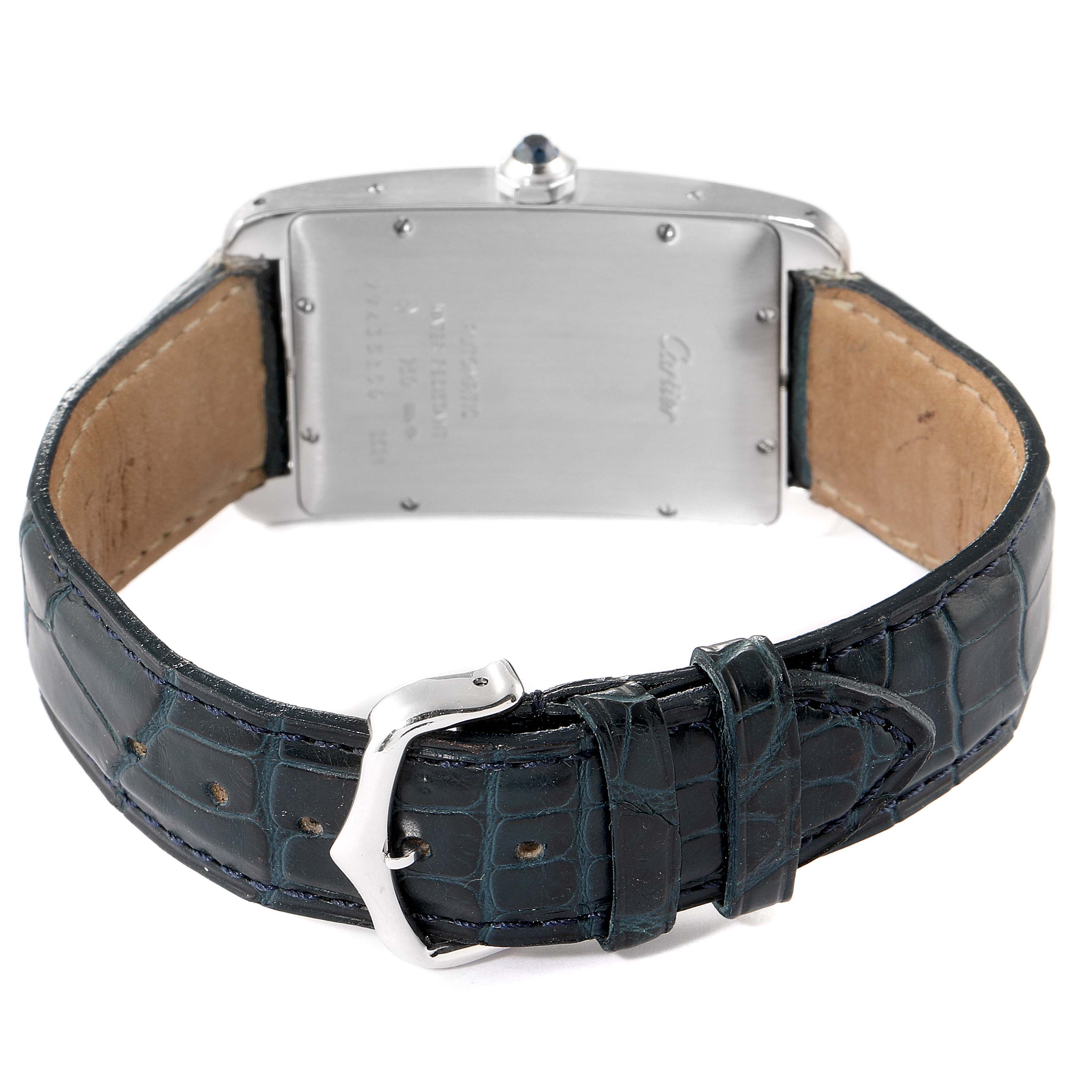 The image shows the back of a Cartier Tank Americaine W2603256 Men's White Gold Silver Dial W2603256 Men's White Gold Silver Dial watch, including the case back, lugs, strap, and buckle.