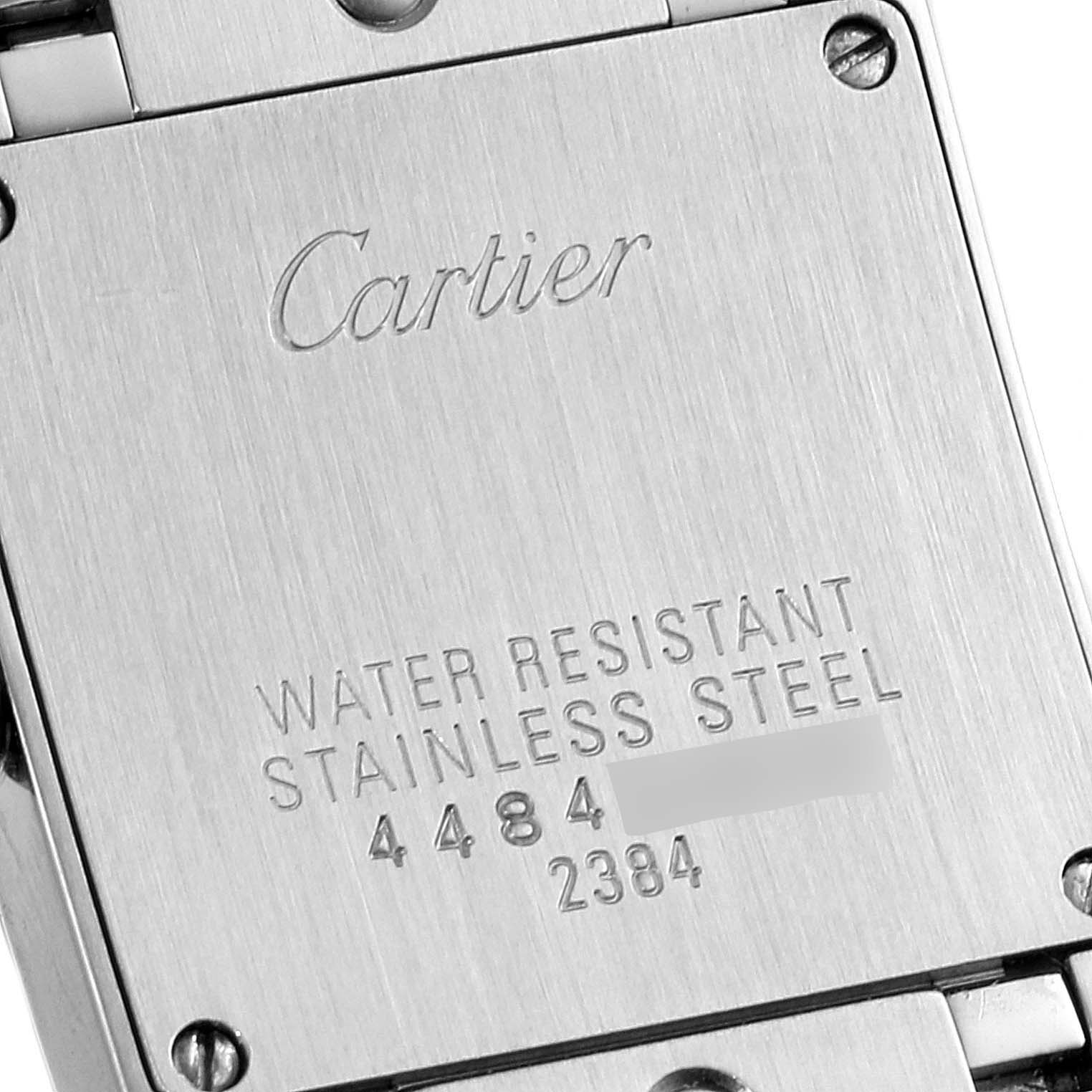The image shows the back case of a Cartier Tank Francaise W51026Q3 Women's Stainless Steel Black Dial W51026Q3 Women's Stainless Steel Black Dial watch, highlighting the brand engraving and water resistance information.