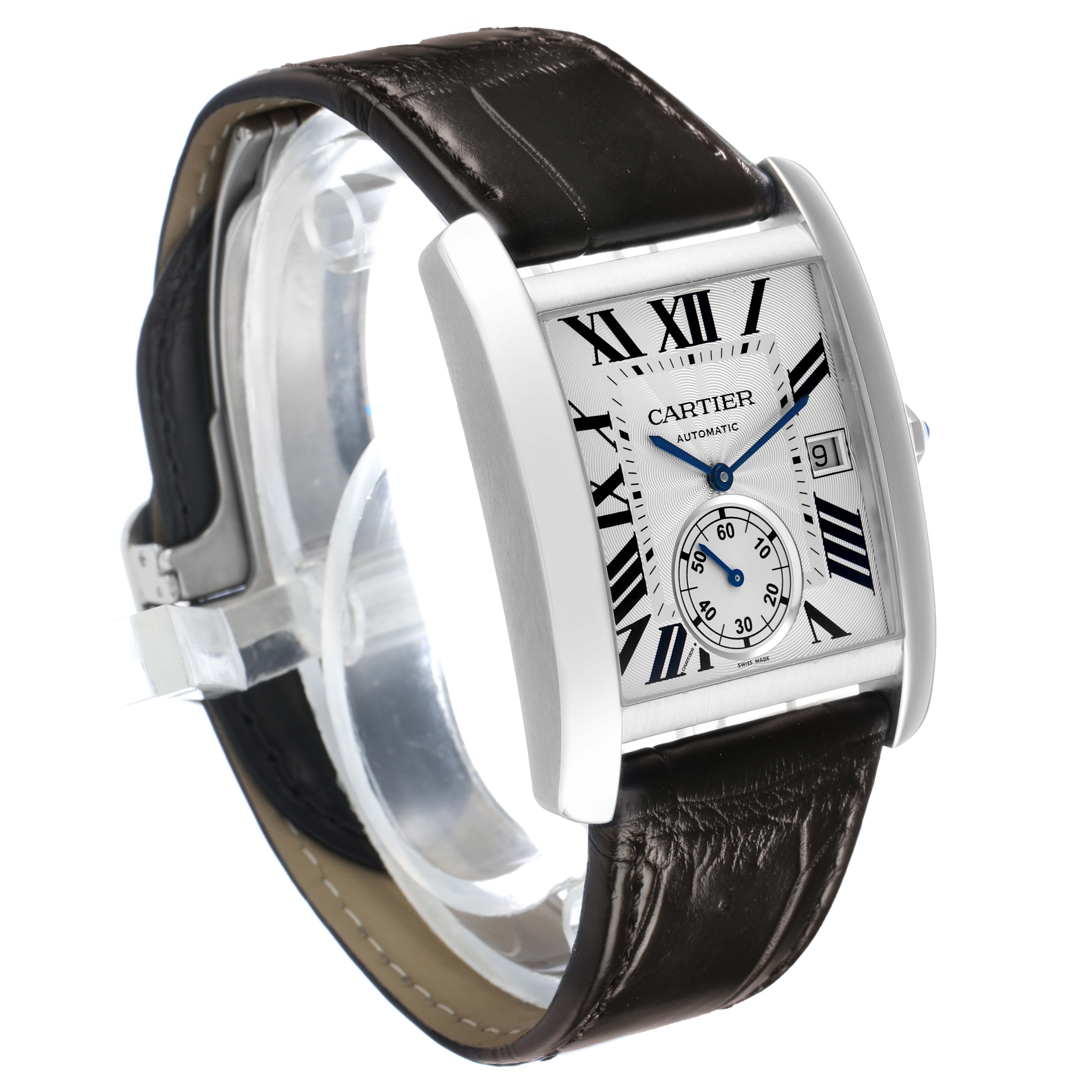 The Cartier Tank MC W5330003 Men's Stainless Steel Silver Dial watch is shown at a slight angle, displaying its rectangular case, Roman numeral dial, brown leather strap, and crown.