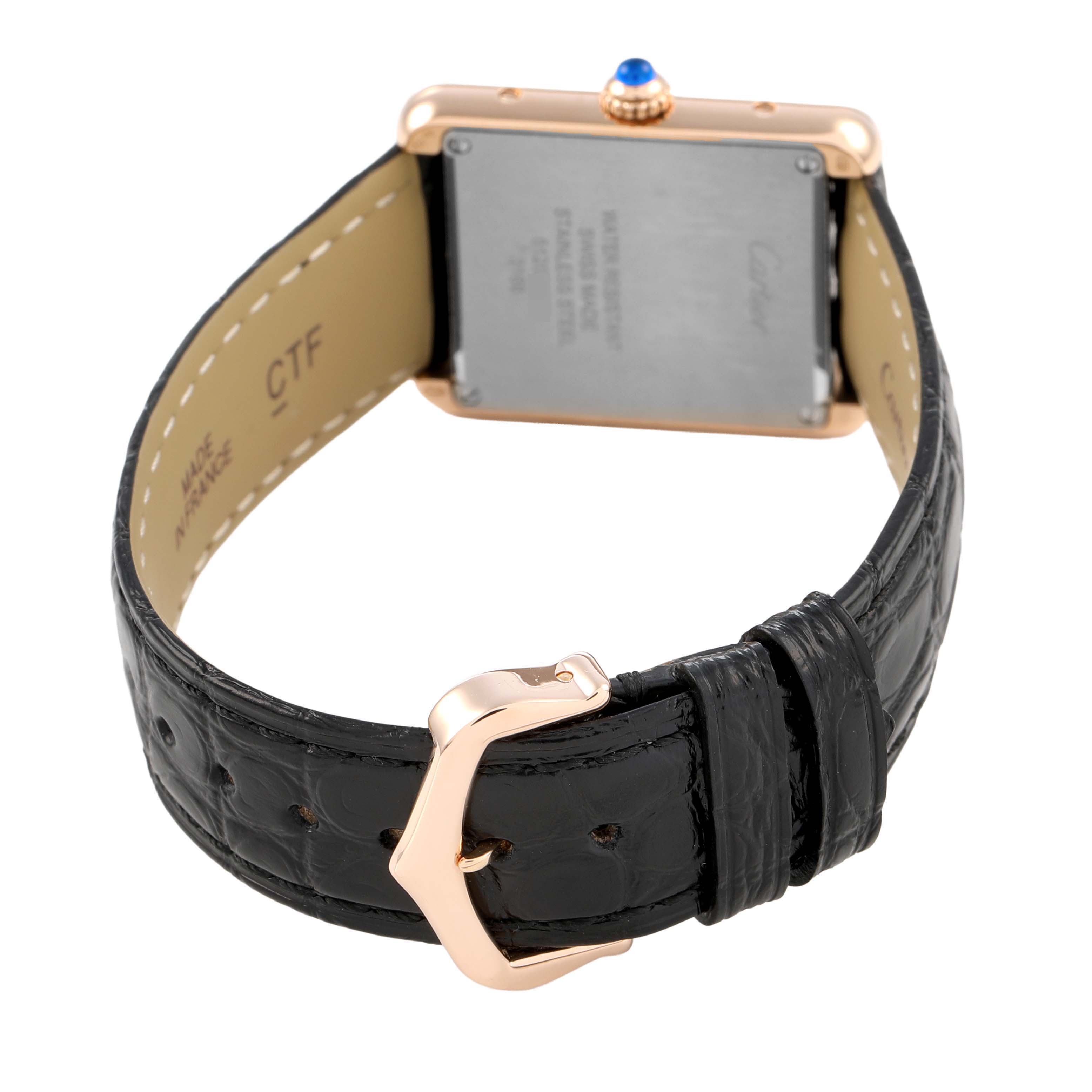 The Cartier Tank Solo W5200024 Women's Rose Gold Silver Dial watch is shown from the back, displaying the case back, strap, and buckle.