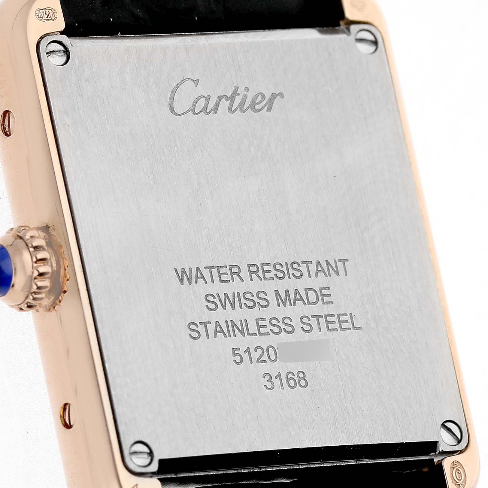The image shows the back of a Cartier Tank Solo W5200024 Women's Rose Gold Silver Dial watch, focusing on the case back and crown.
