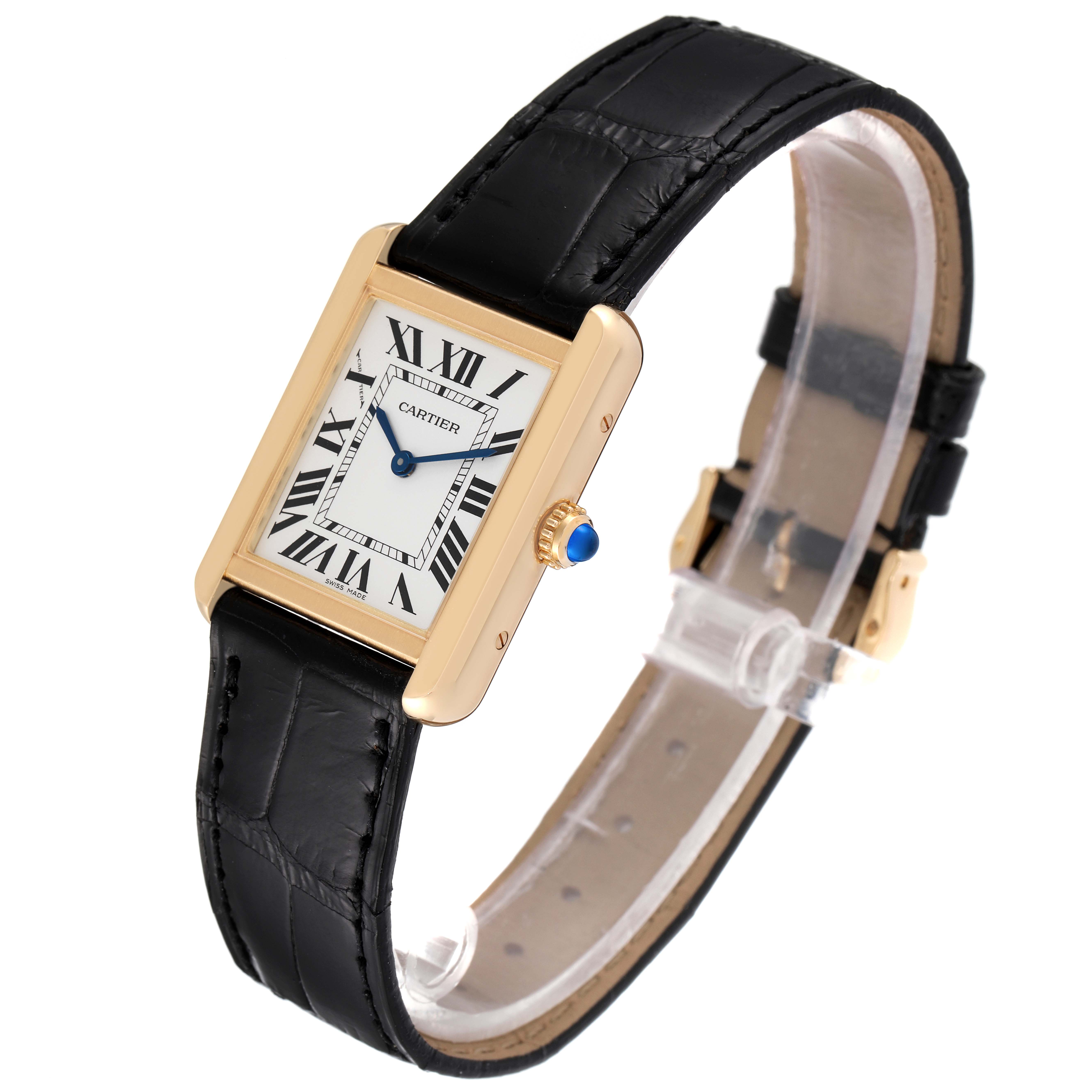 The Cartier Tank Solo W5200002 Women's Yellow Gold Silver Dial W5200002 Women's Yellow Gold Silver Dial watch is shown at a slight angle, displaying its black leather strap, square face with Roman numerals, and gold casing.