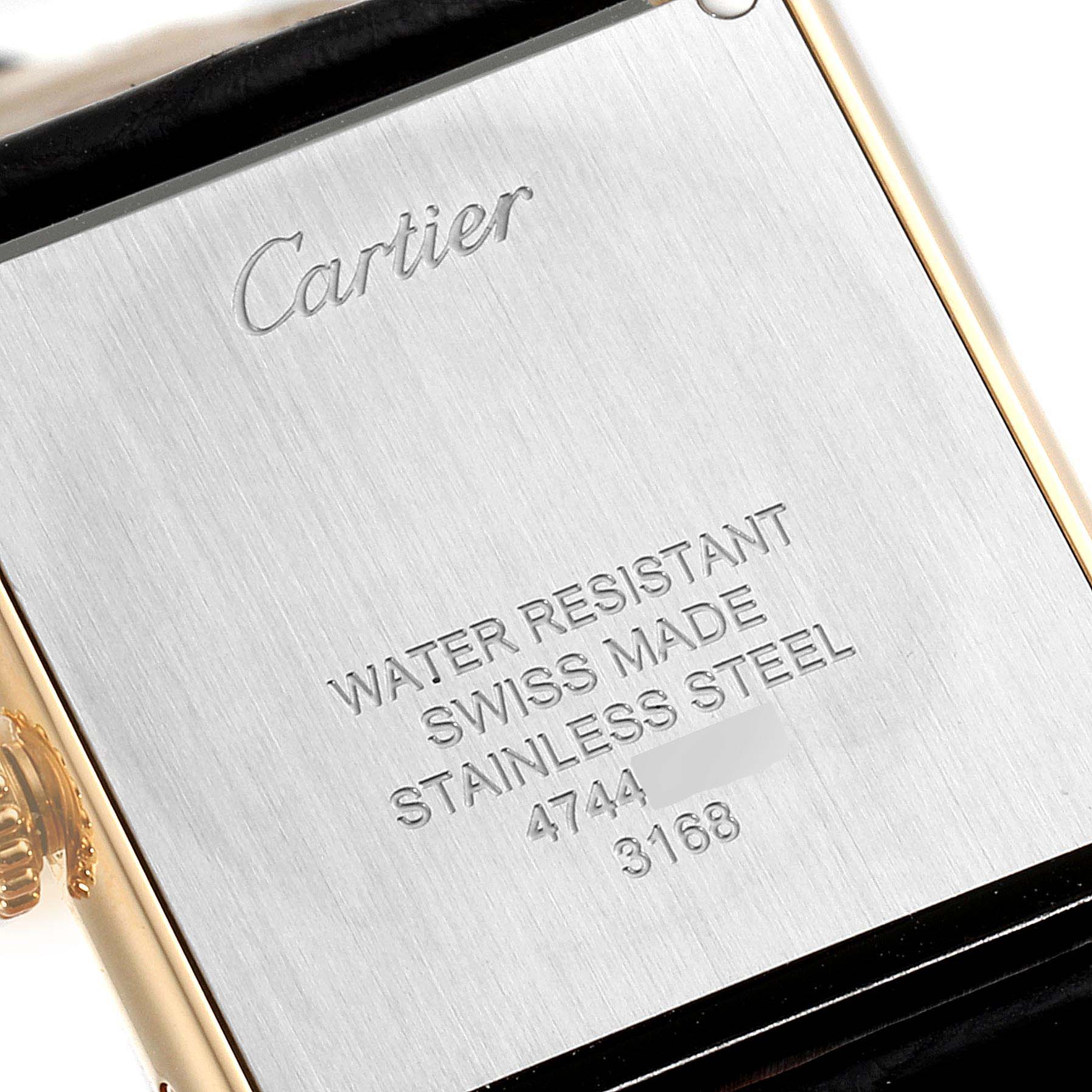 This image shows the back case and crown of a Cartier Tank Solo W5200002 Women's Yellow Gold Silver Dial W5200002 Women's Yellow Gold Silver Dial watch.