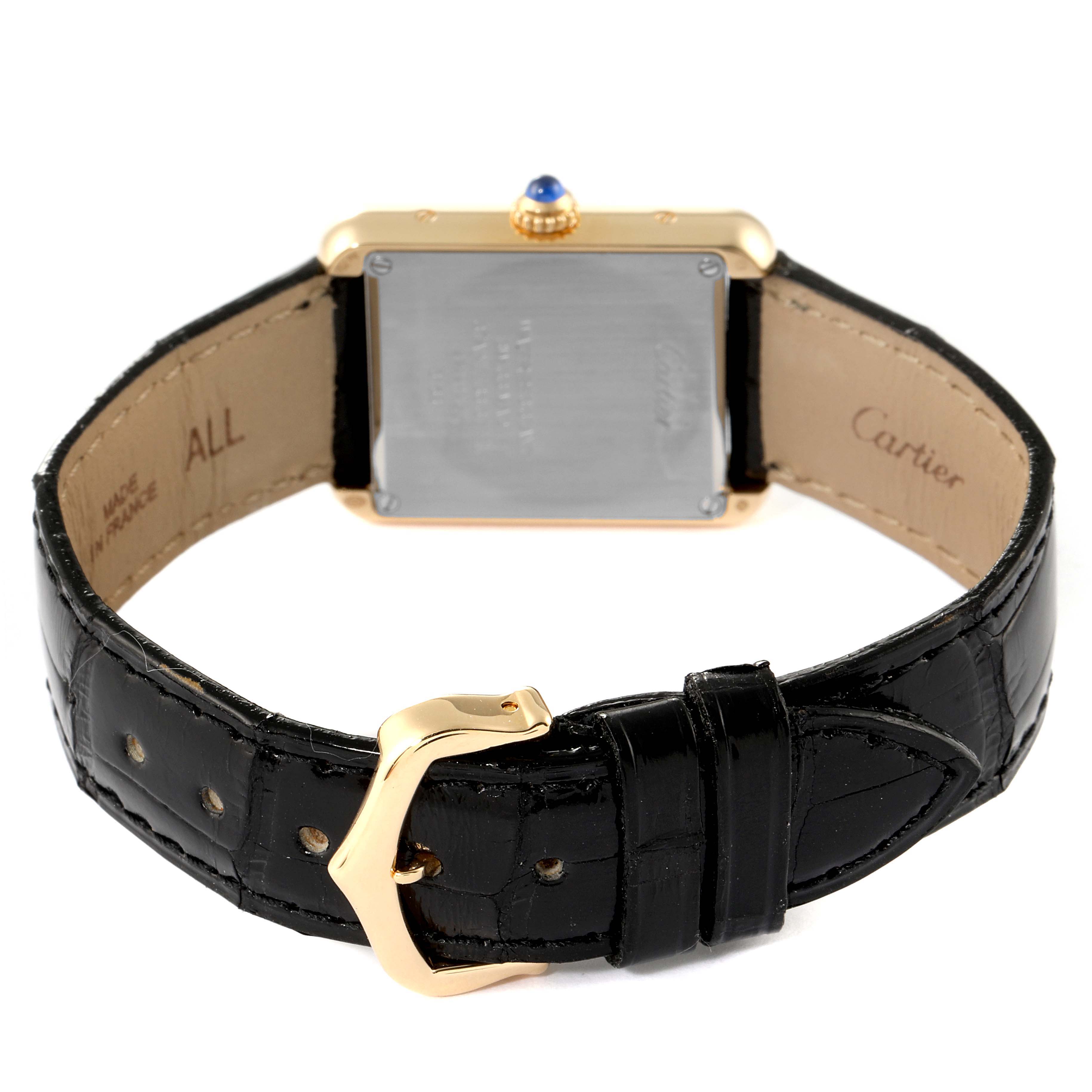 This image shows the back and strap of a Cartier Tank Solo W5200002 Women's Yellow Gold Silver Dial W5200002 Women's Yellow Gold Silver Dial watch, highlighting its buckle and caseback from a rear angle.